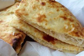 Order Coconut Naan food online from The Royal Indian Cuisine store, Philadelphia on bringmethat.com