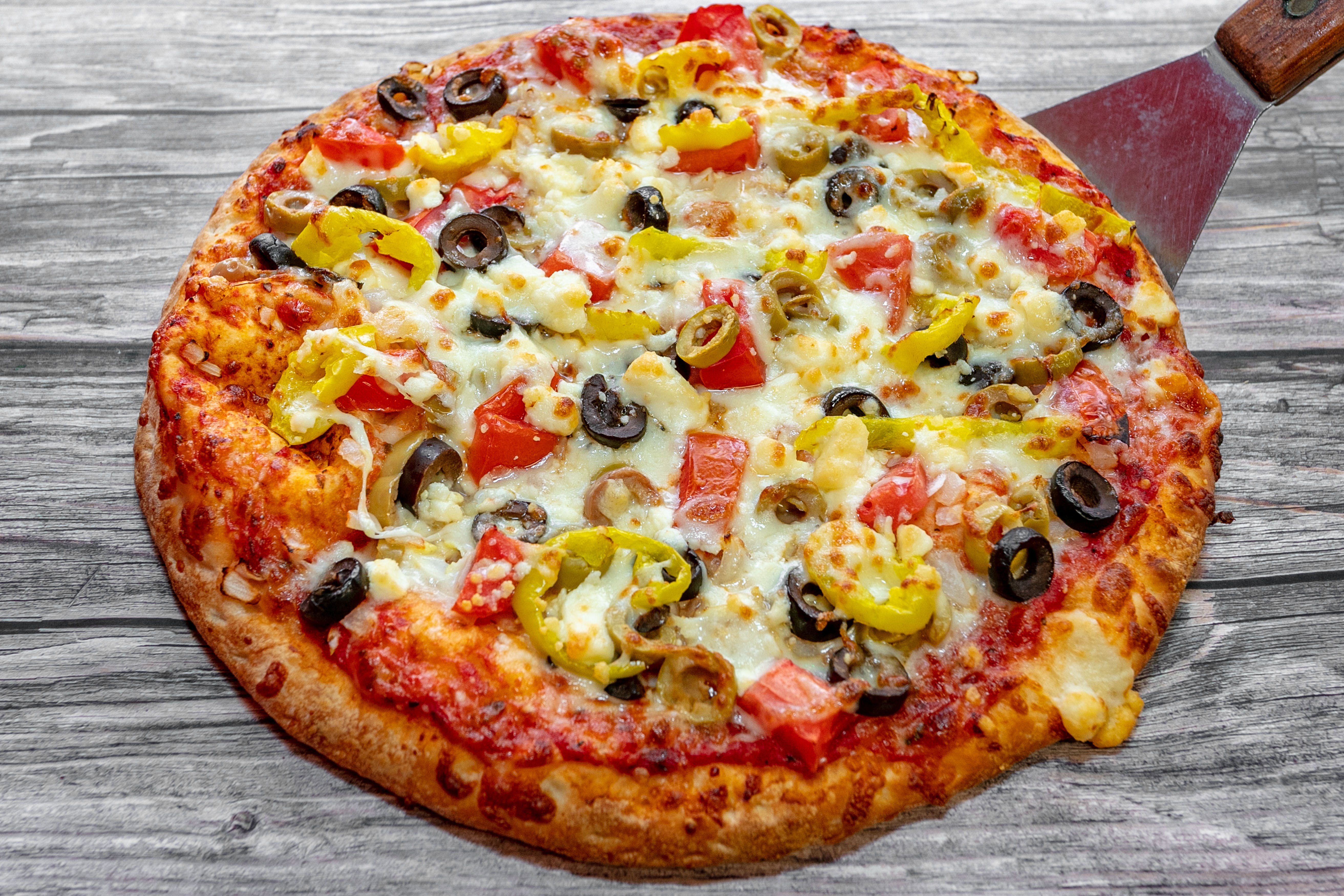 Order Greek Pizza - X-Large 16" food online from Pizza Place store, Adairsville on bringmethat.com