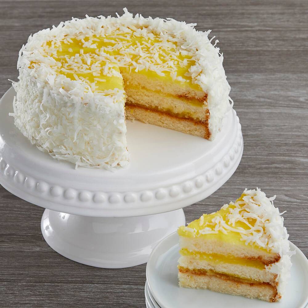Order New 6" Whole Coconut Lemon Cake food online from Ny Popcorn store, New York on bringmethat.com