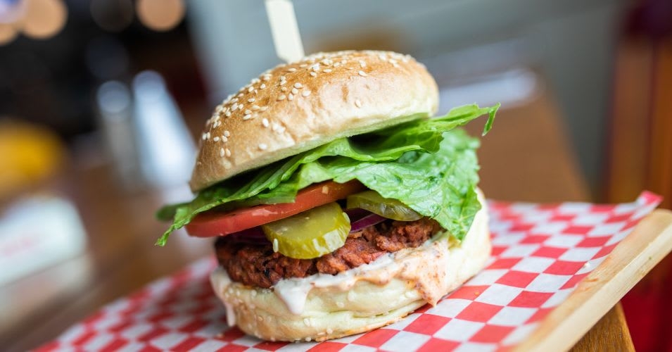 Order Vegan Burger (V) food online from La Creme Cafe store, Los Angeles on bringmethat.com