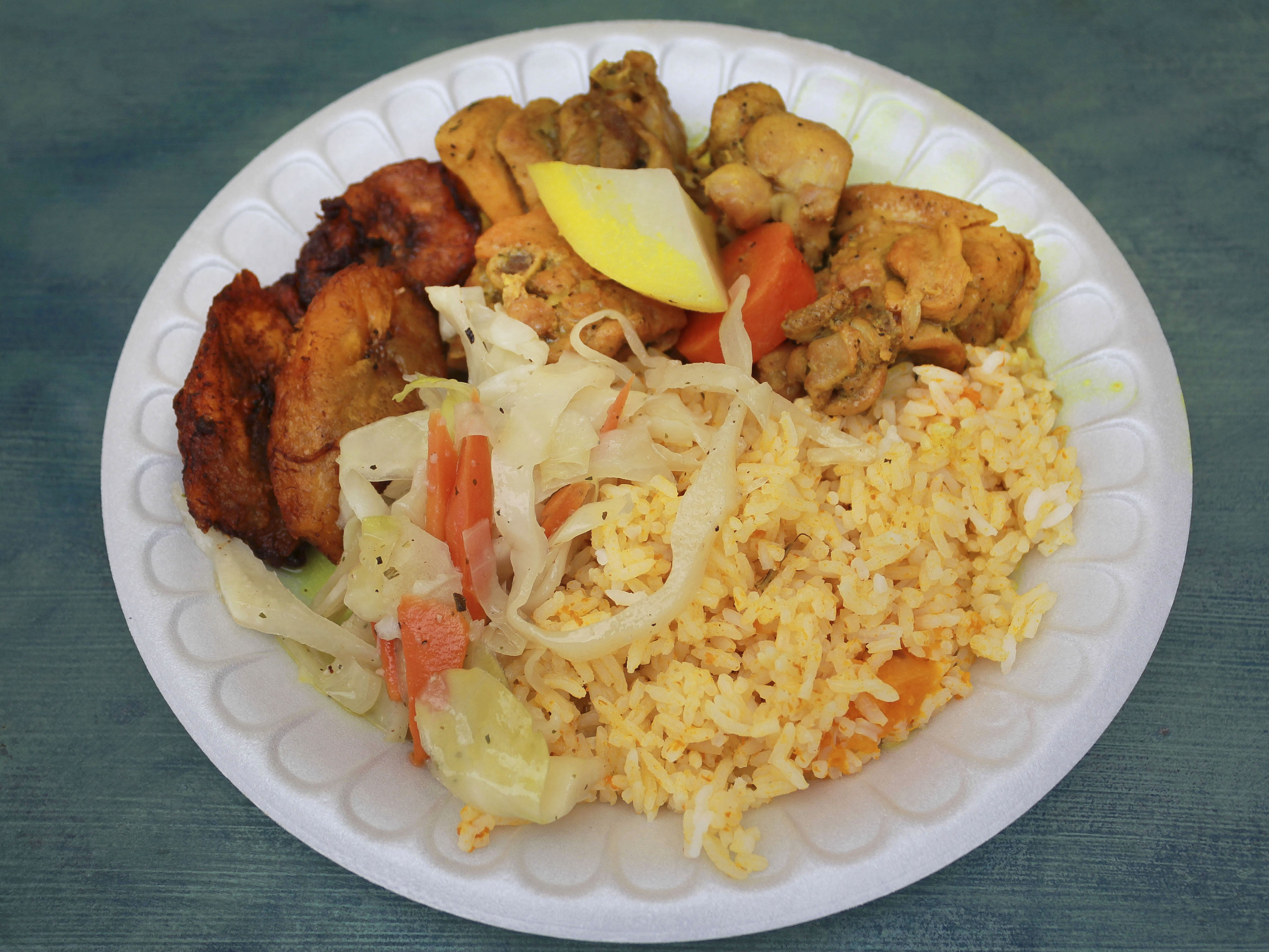 Order Curry Chicken food online from Jerk Machine store, Fort Lauderdale on bringmethat.com