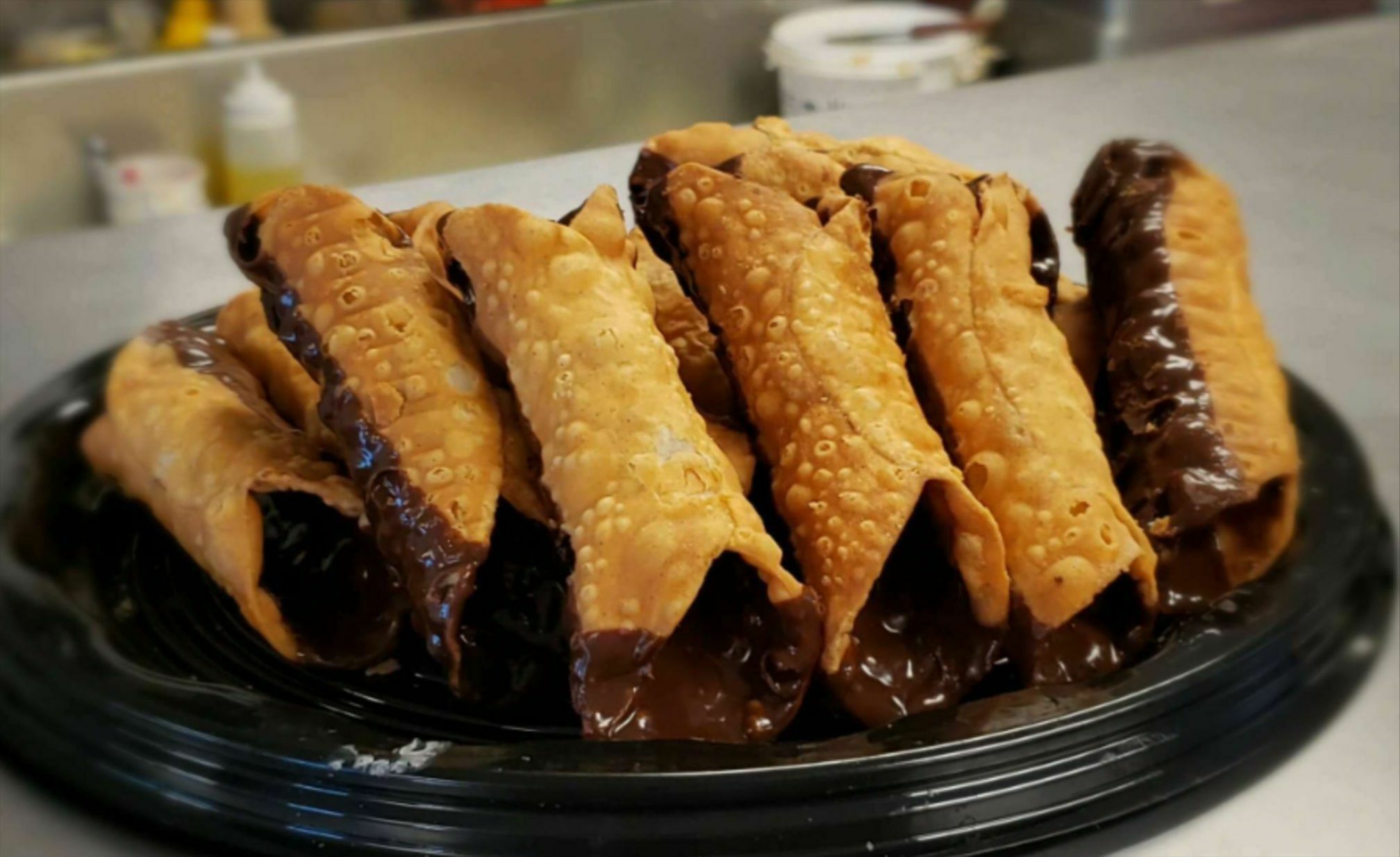 Order Fresh Cannoli food online from A Cut Above Deli store, Canton on bringmethat.com