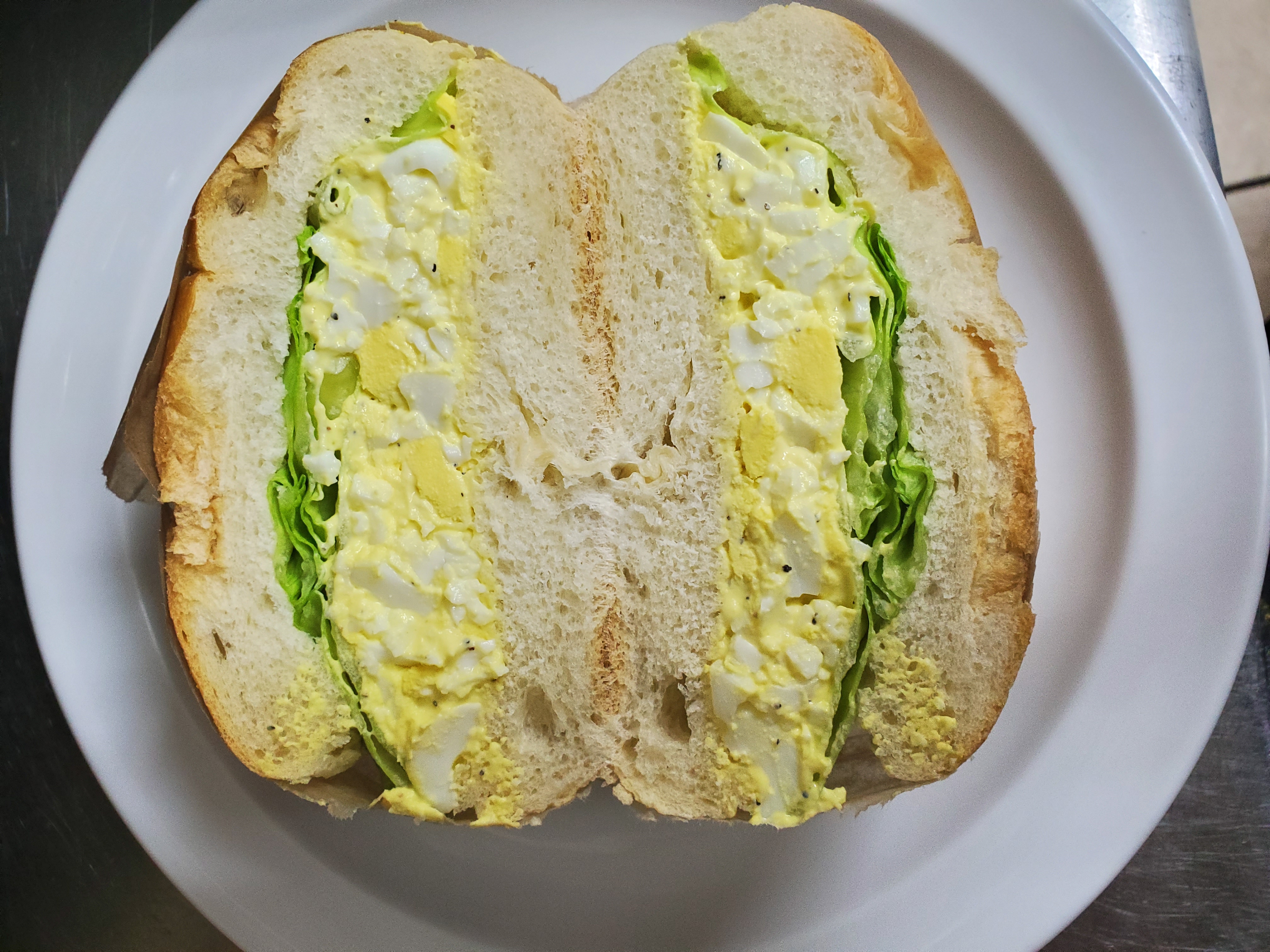 Order Egg salad sandwiched food online from Aminas Cafe store, Bronx on bringmethat.com