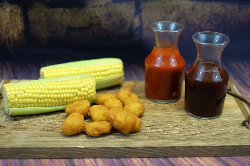 Order Sweet-Corn Nuggets - 10 Pieces food online from Oscar's Pizza store, Colonie on bringmethat.com