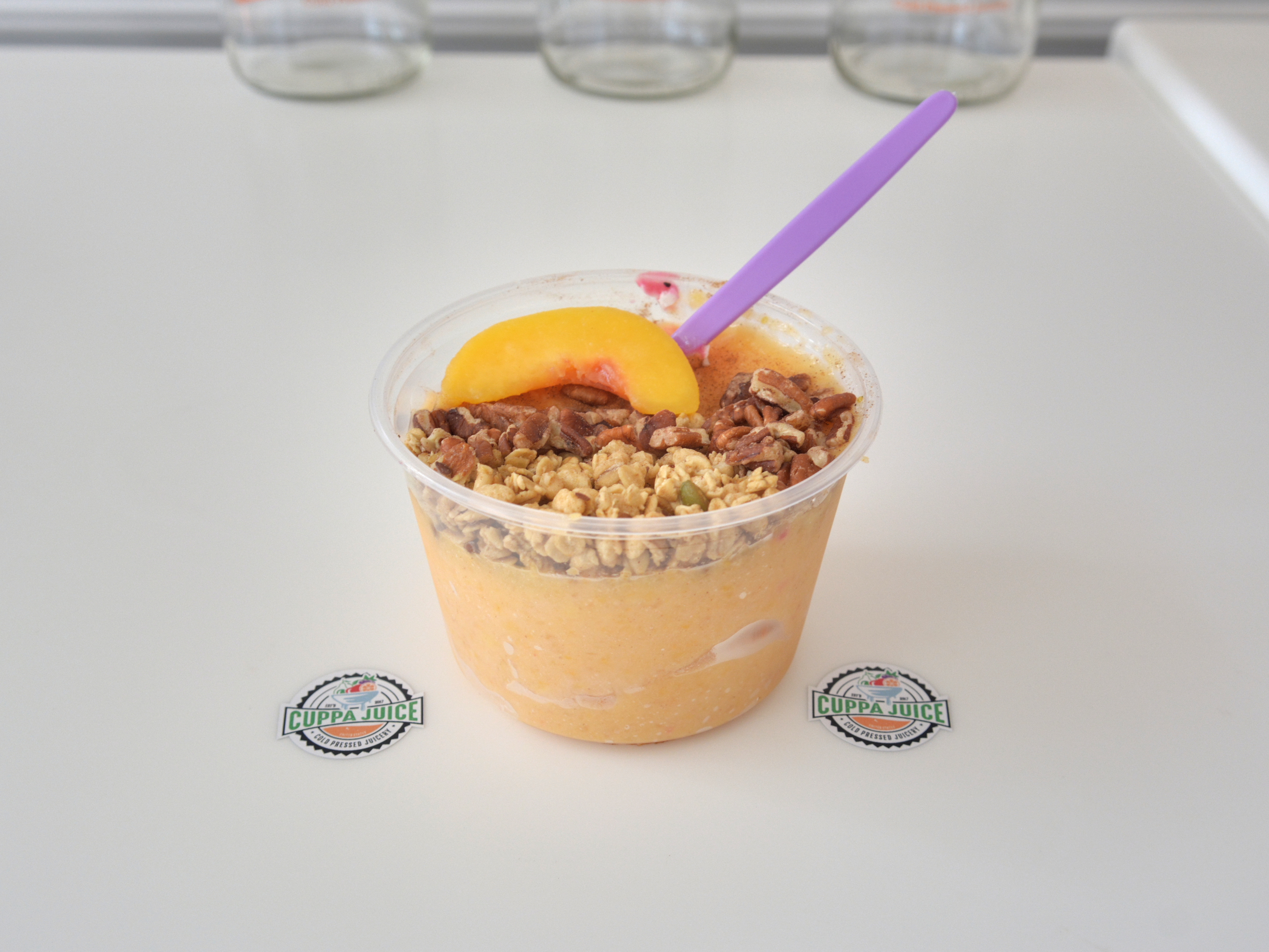 Order Harvest Peach Bowl food online from Cuppa Juice Cold Pressed Juicery store, San Marcos on bringmethat.com