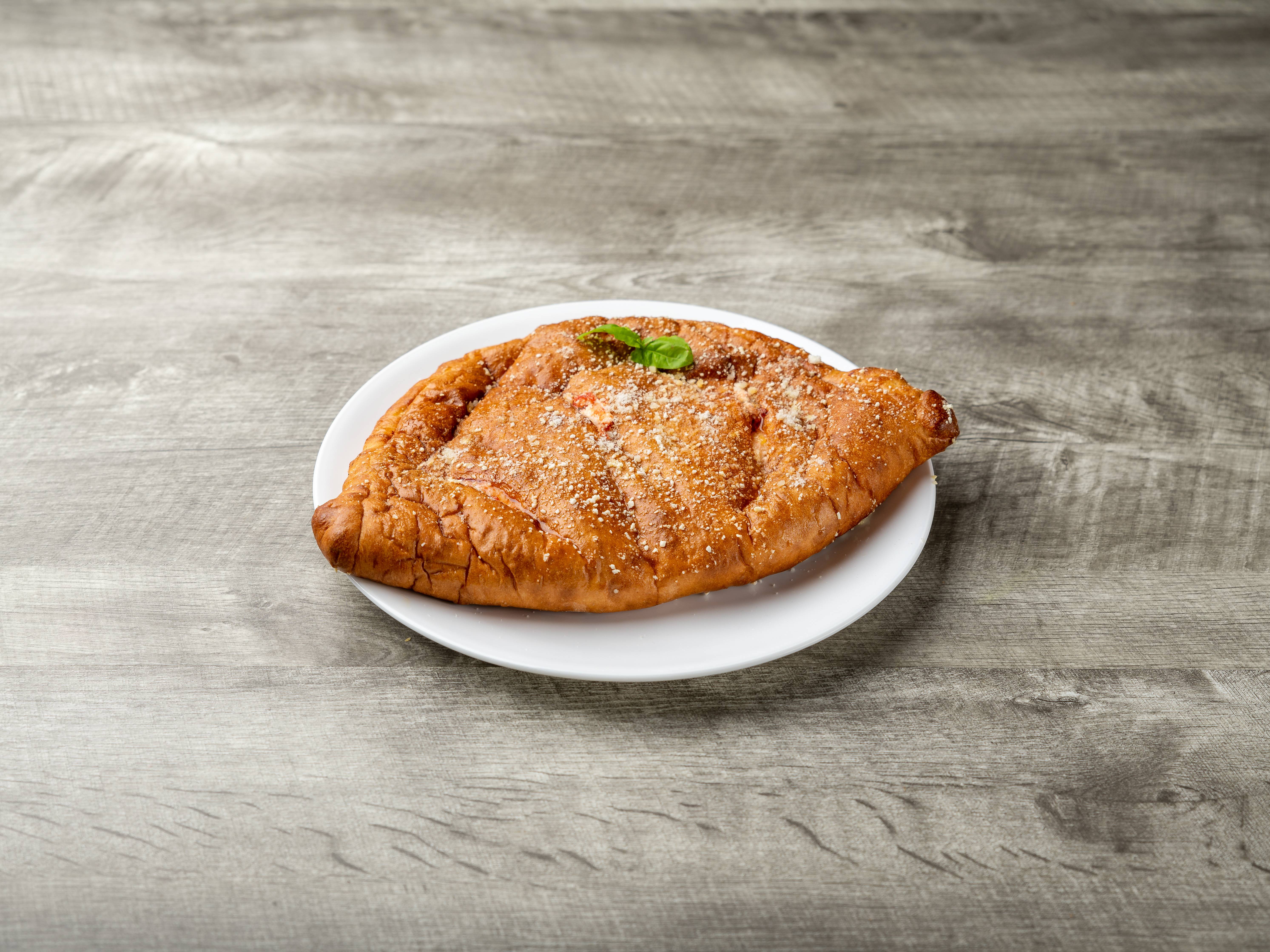 Order Italian Calzone food online from Cerasoli Pizzeria store, Pittsburgh on bringmethat.com