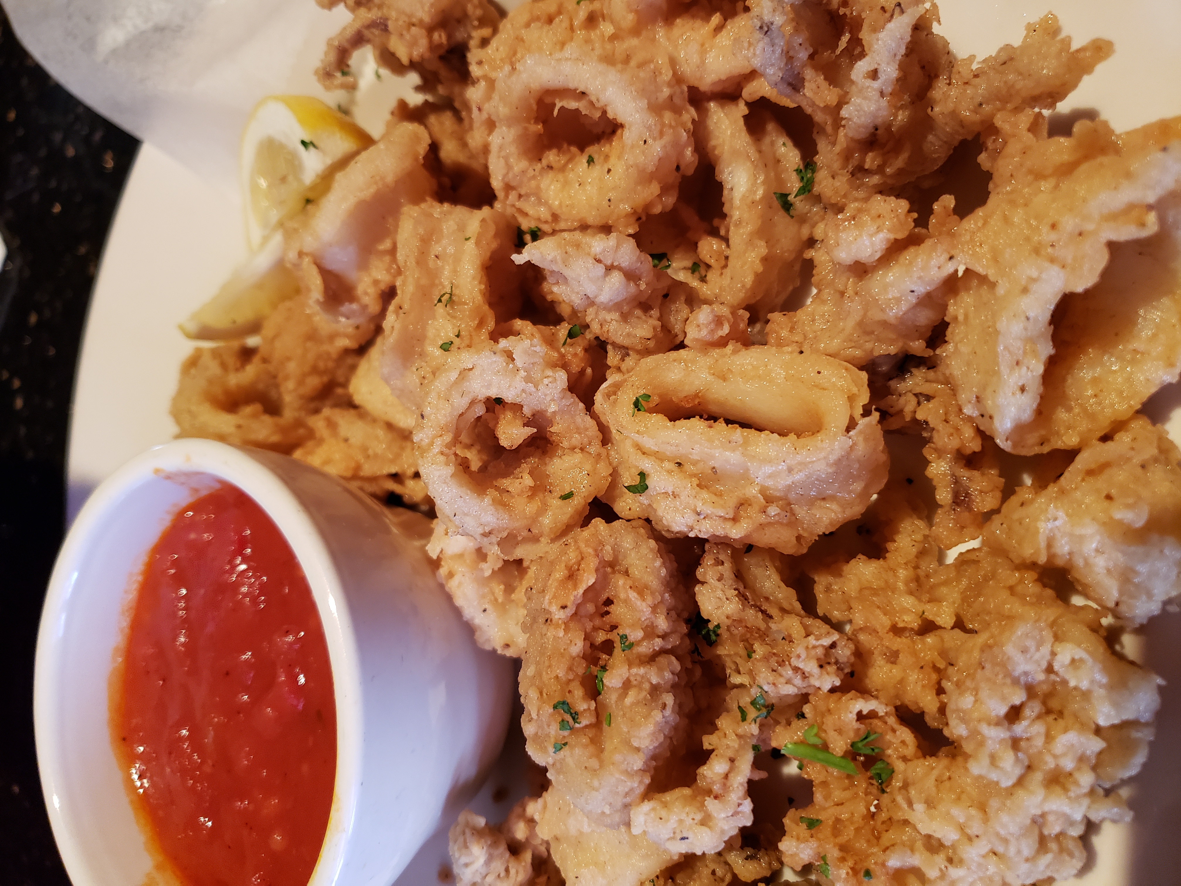 Order Fried Calamari food online from Amiccis store, Baltimore on bringmethat.com