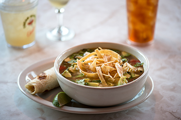 Order Tortilla Soup food online from Chuys Mesquite Broiler Restaurant store, Stevenson Ranch on bringmethat.com