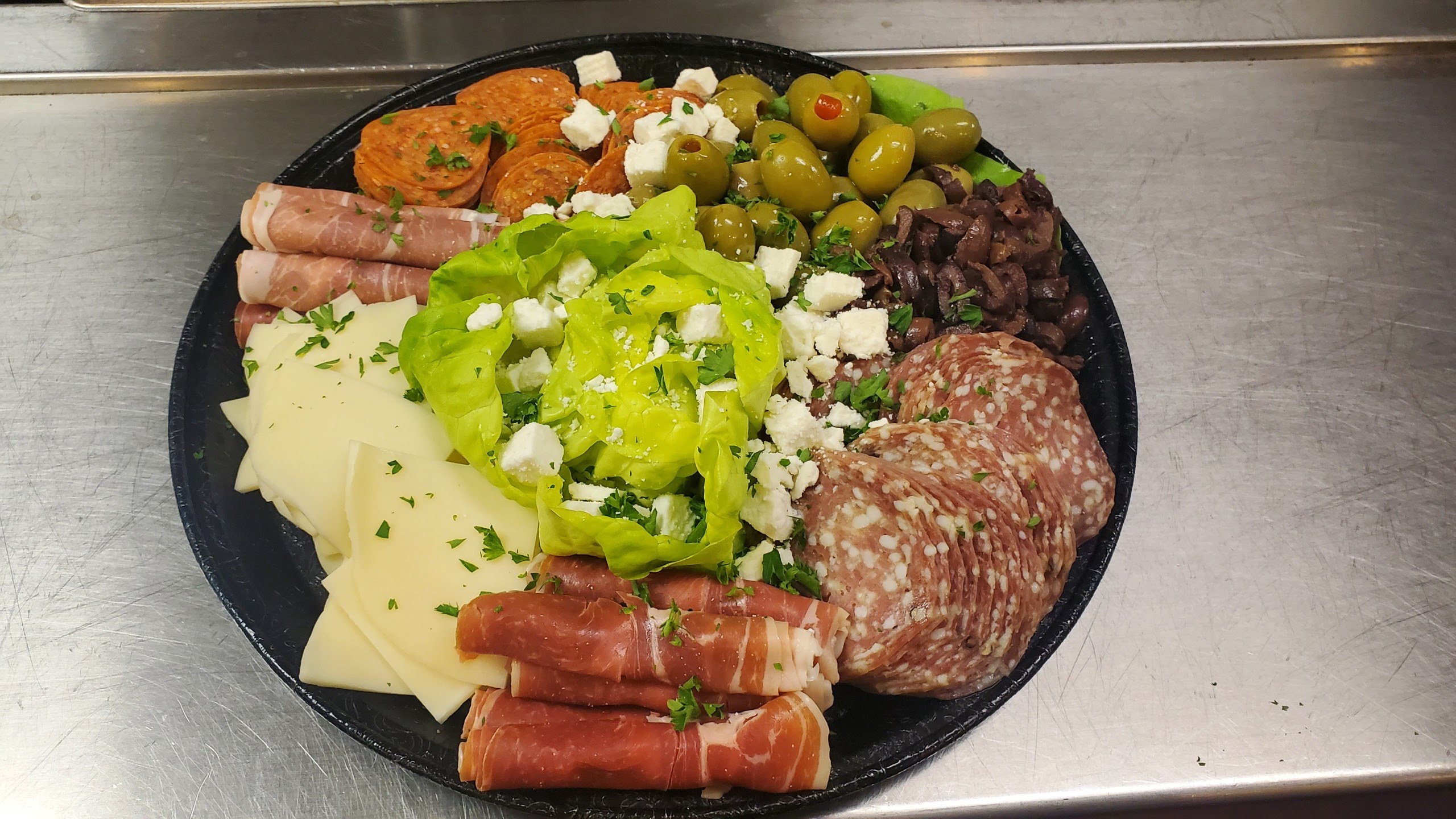 Order 12″ Antipasto Platter with Roasted Mushrooms food online from Popolo Catering store, San Luis Obispo on bringmethat.com