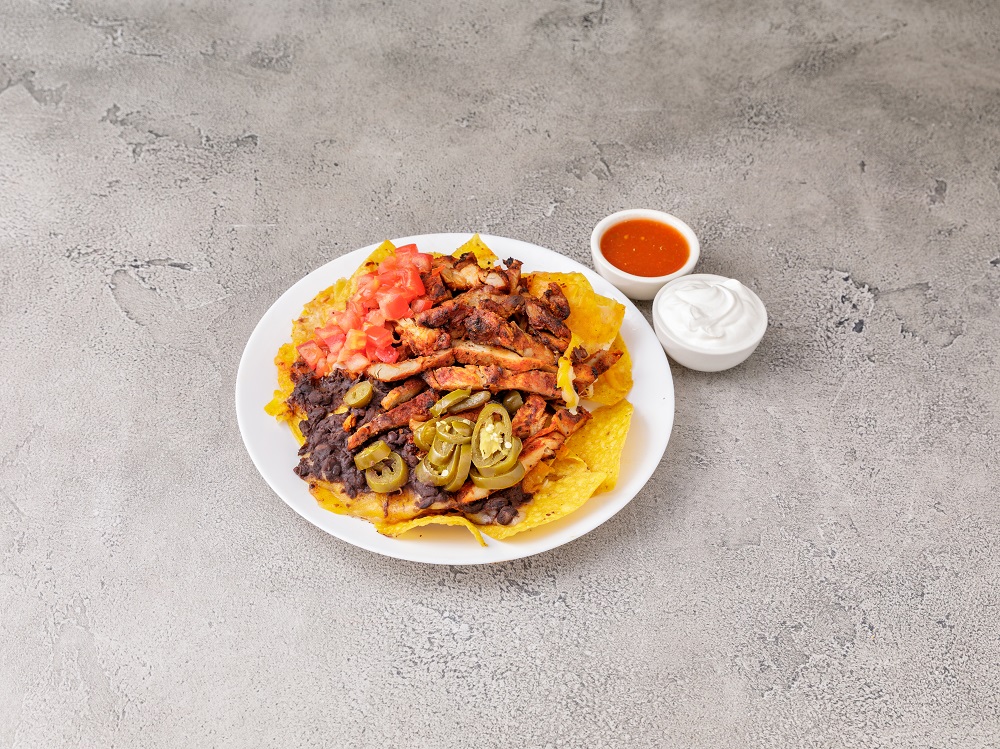 Order N4. Nachos with Chicken food online from The First Tortilla Grill store, Rockville Centre on bringmethat.com