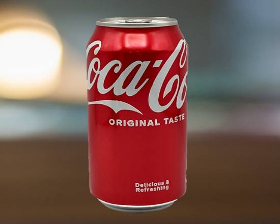Order Coke Can 12 oz food online from Thai Curry store, Arlington on bringmethat.com