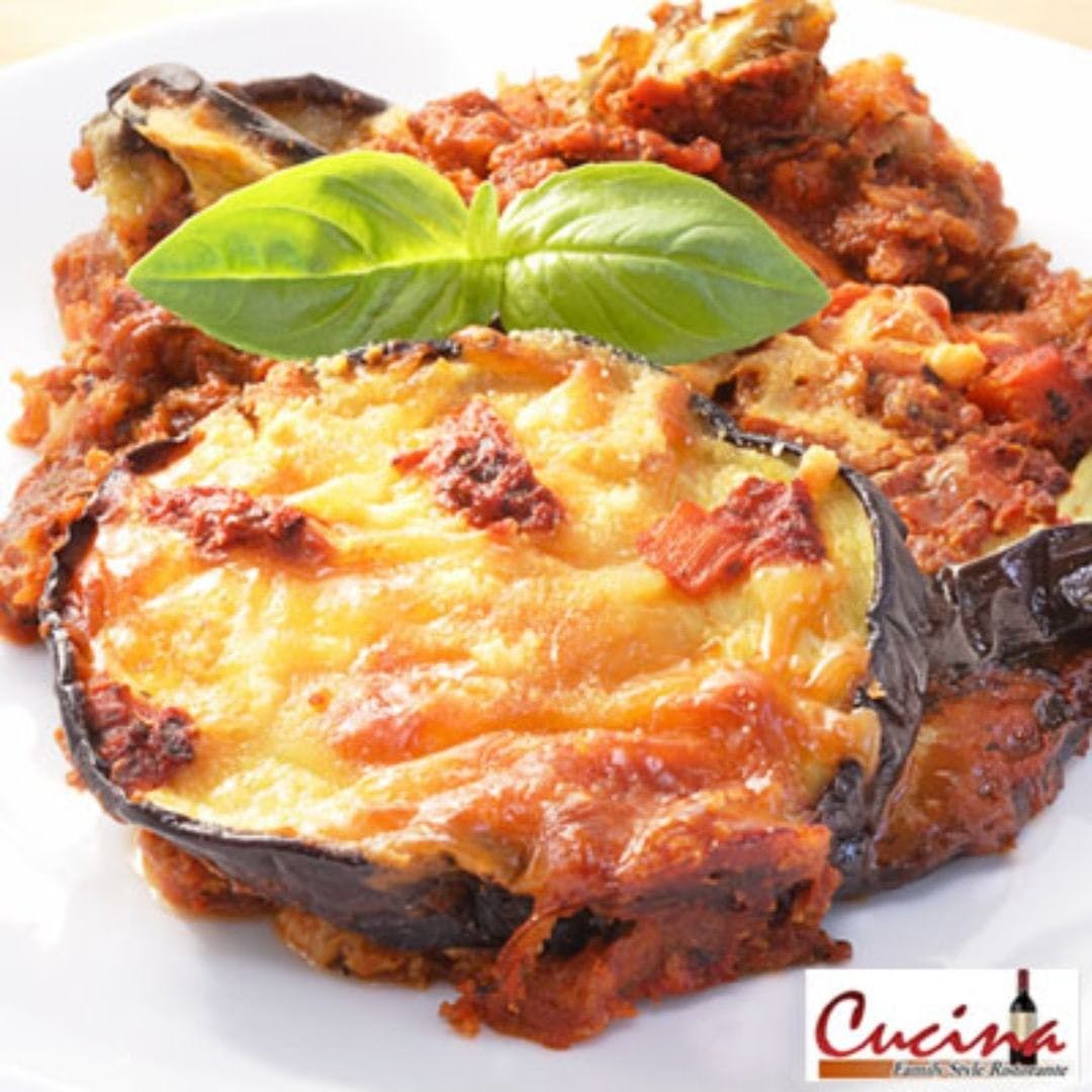 Order Eggplant Parmigiana - Half (Serves 1 Person) food online from Cucina Family Style Restorante store, East Quogue on bringmethat.com