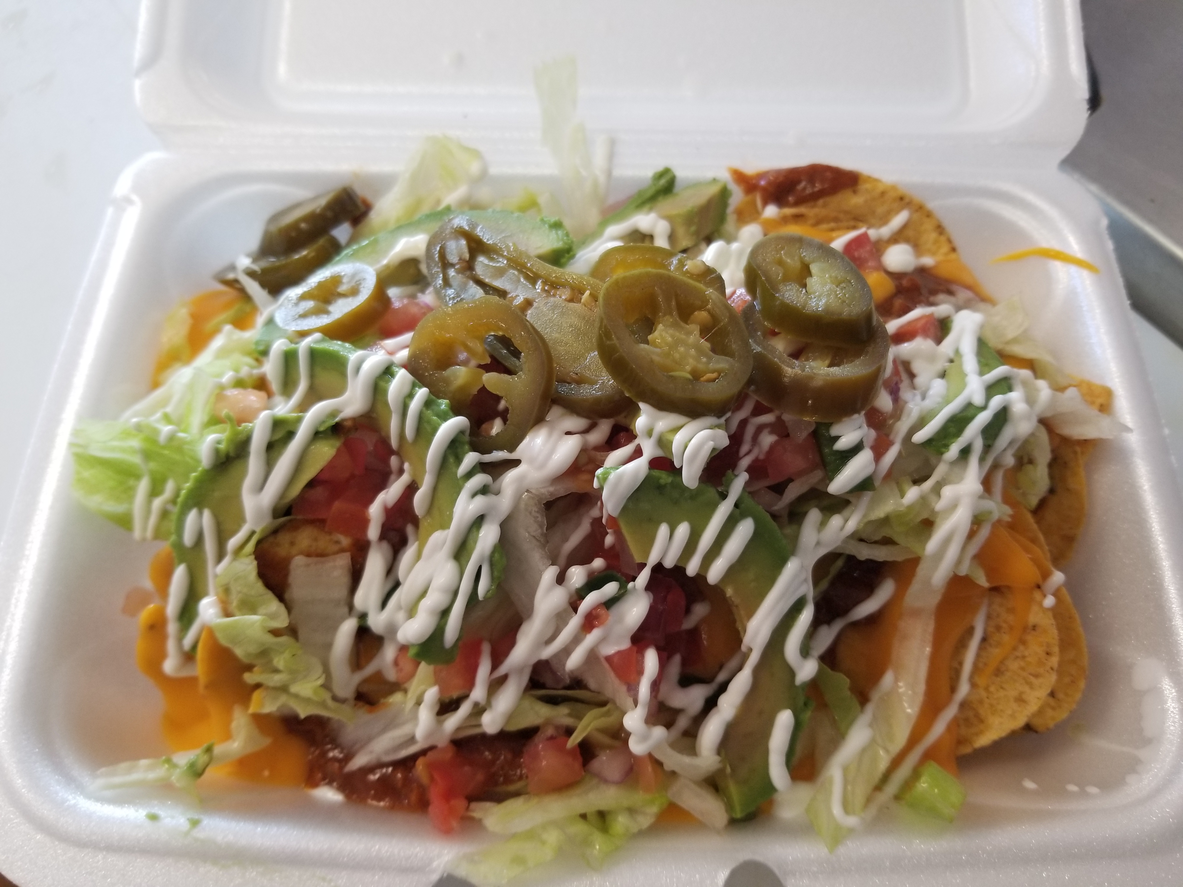 Order Nachos with cheese and Chili with Meat food online from La michoacana Supreme store, Wood Dale on bringmethat.com