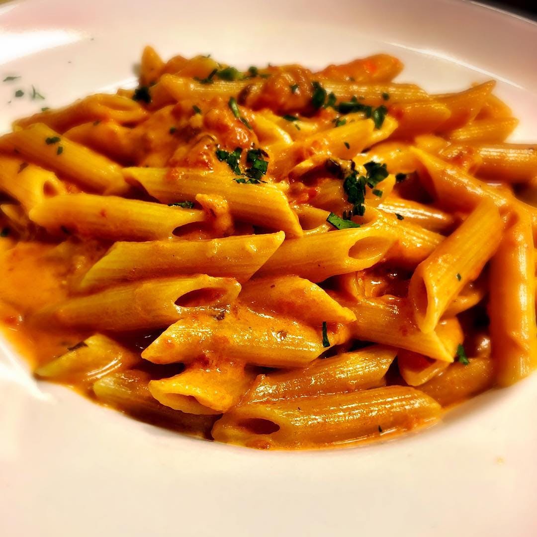 Order Penne Vodka - Entree food online from Tomato Tomato store, Stamford on bringmethat.com