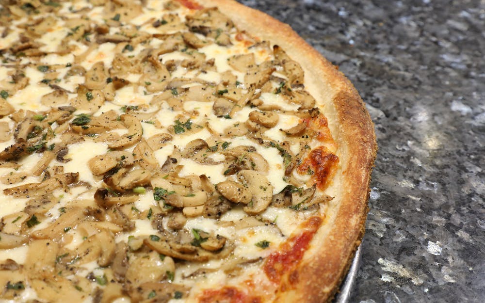 Order Mushroom Pizza - Pizza food online from Little italy pizza store, New York on bringmethat.com