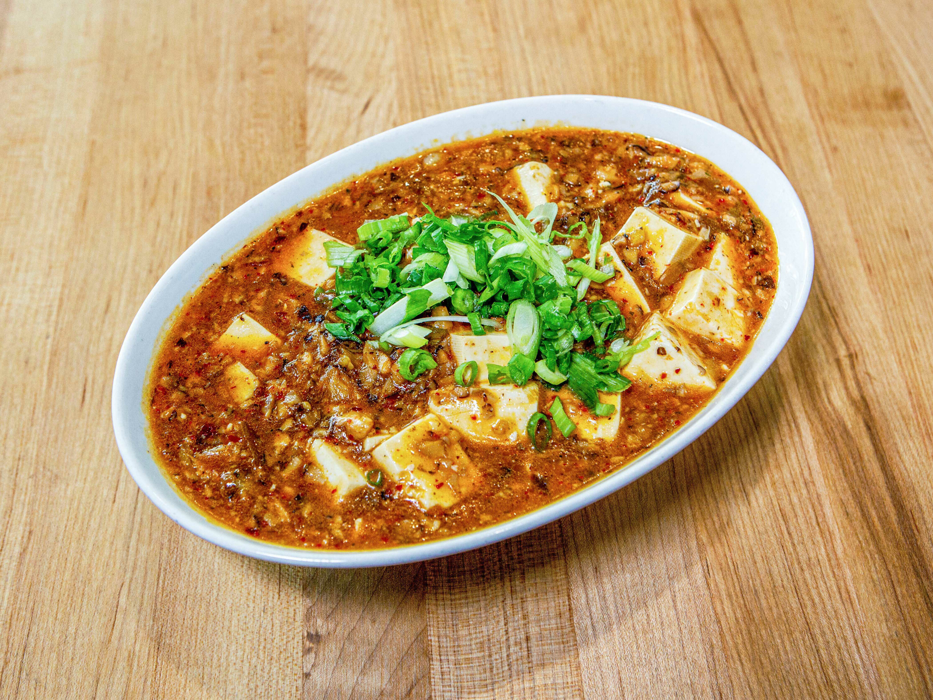 Order mapo tofu with crab food online from Dan Modern Chinese store, Manhattan Beach on bringmethat.com