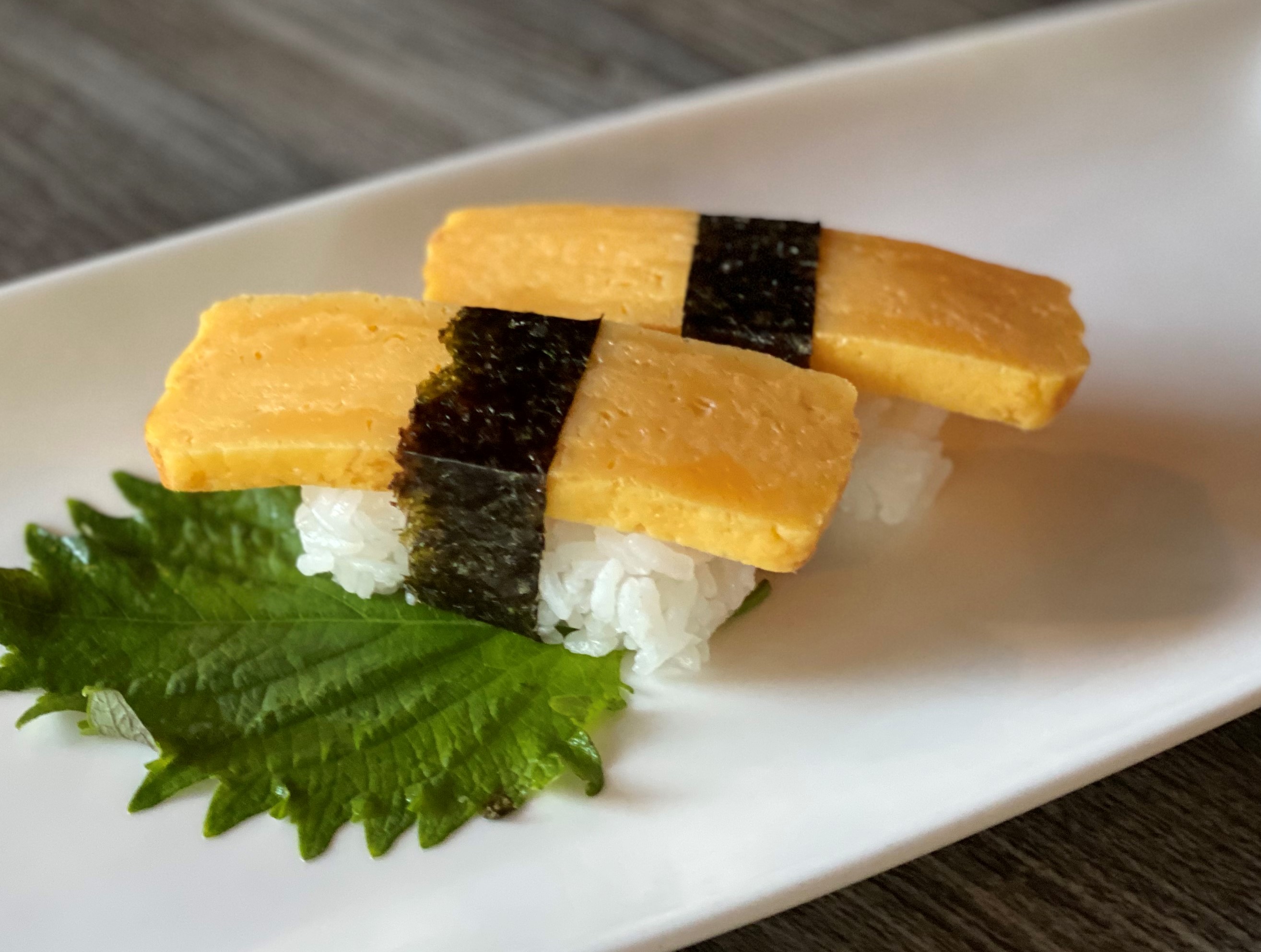 Order Sweet Egg Nigiri food online from Sushi Confidential store, Campbell on bringmethat.com