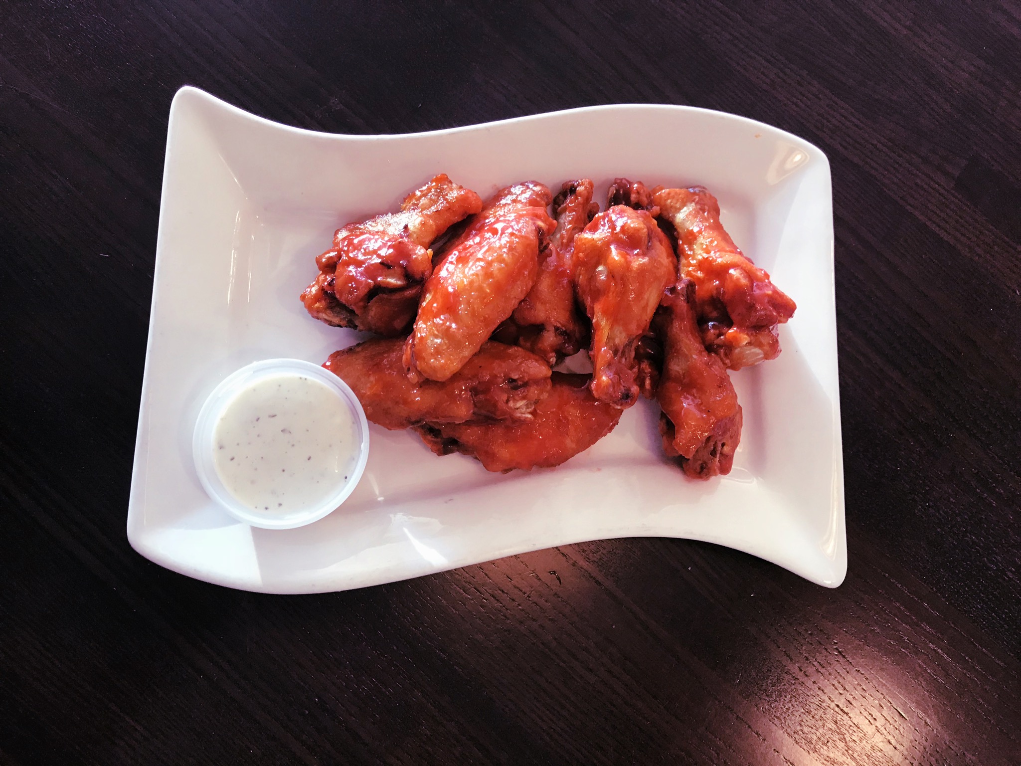 Order 10 Piece Famous BBQ Wings food online from Nino's Pizza & Restaurant store, Hillsdale on bringmethat.com
