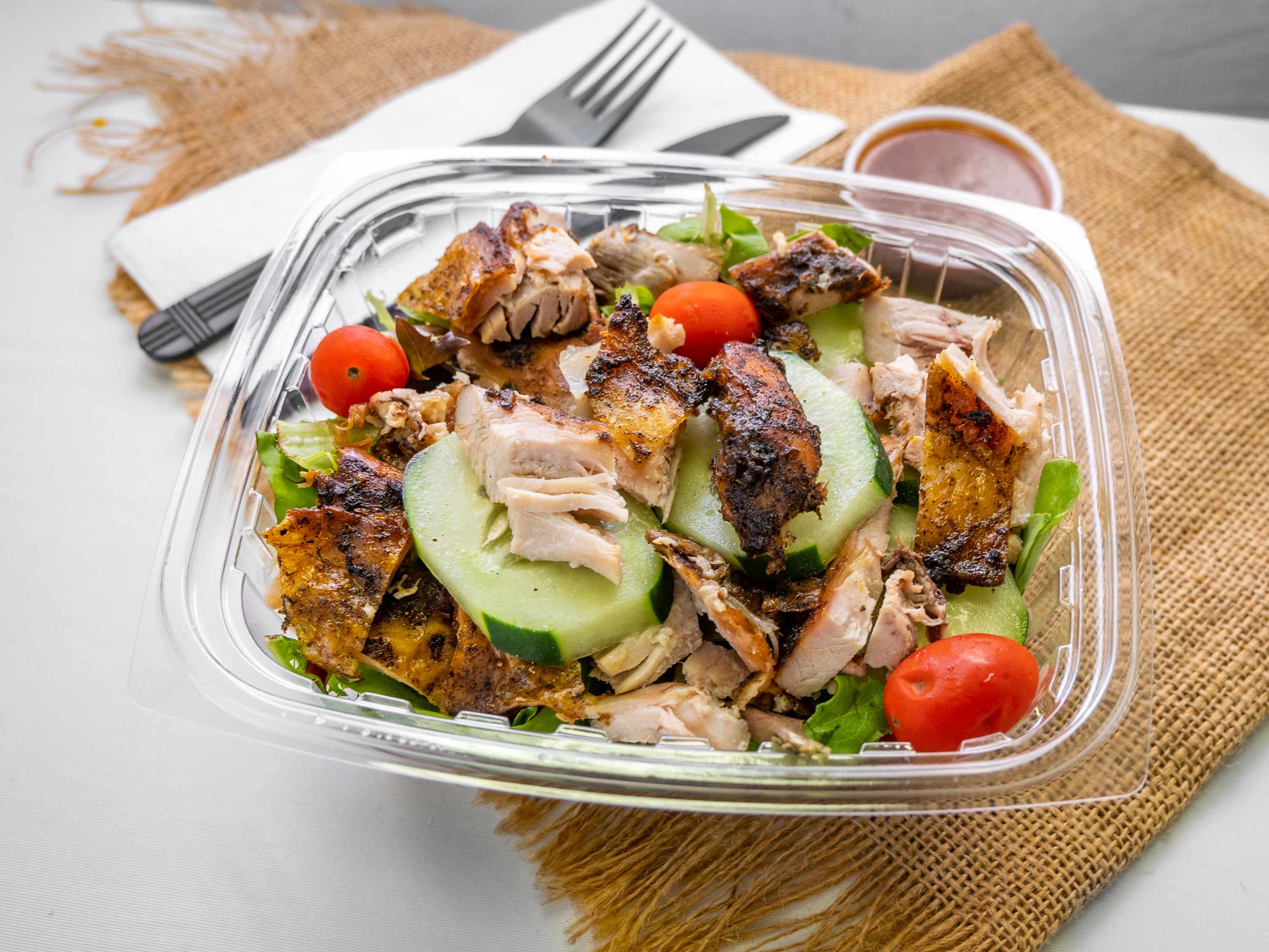 Order Jerk Chicken Salad food online from Grapes Real Jamaican Cuisine store, Wilmington on bringmethat.com