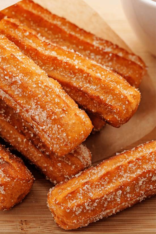 Order Churros food online from Zandra's Taqueria store, Haymarket on bringmethat.com