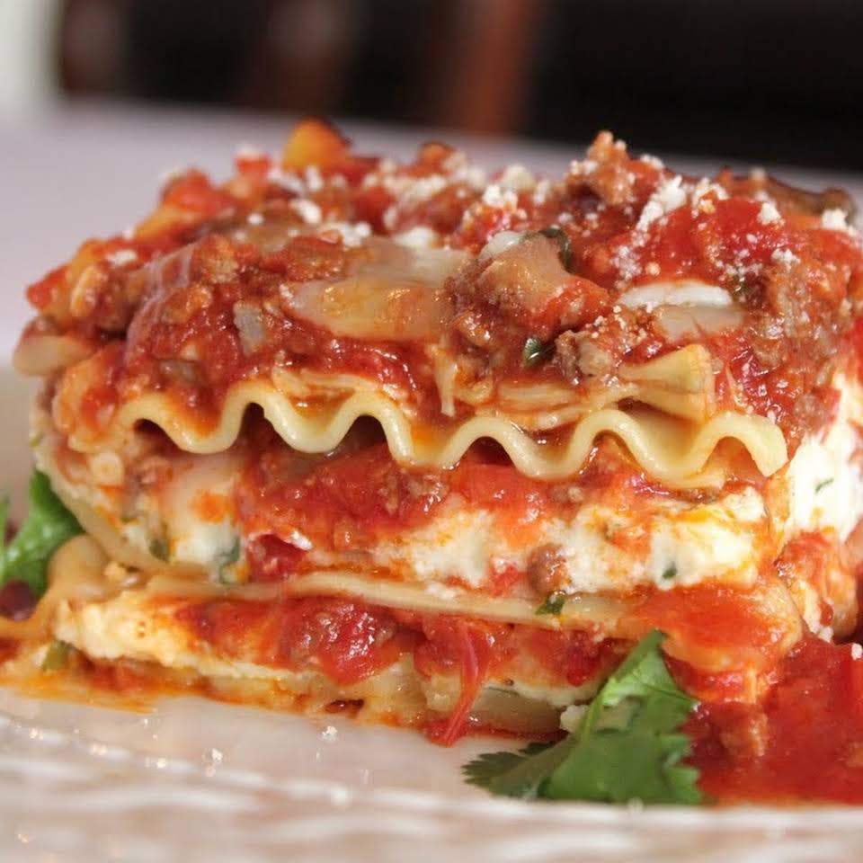 Order Spinach Lasagna - Pasta food online from Mario Pizza store, Washington on bringmethat.com