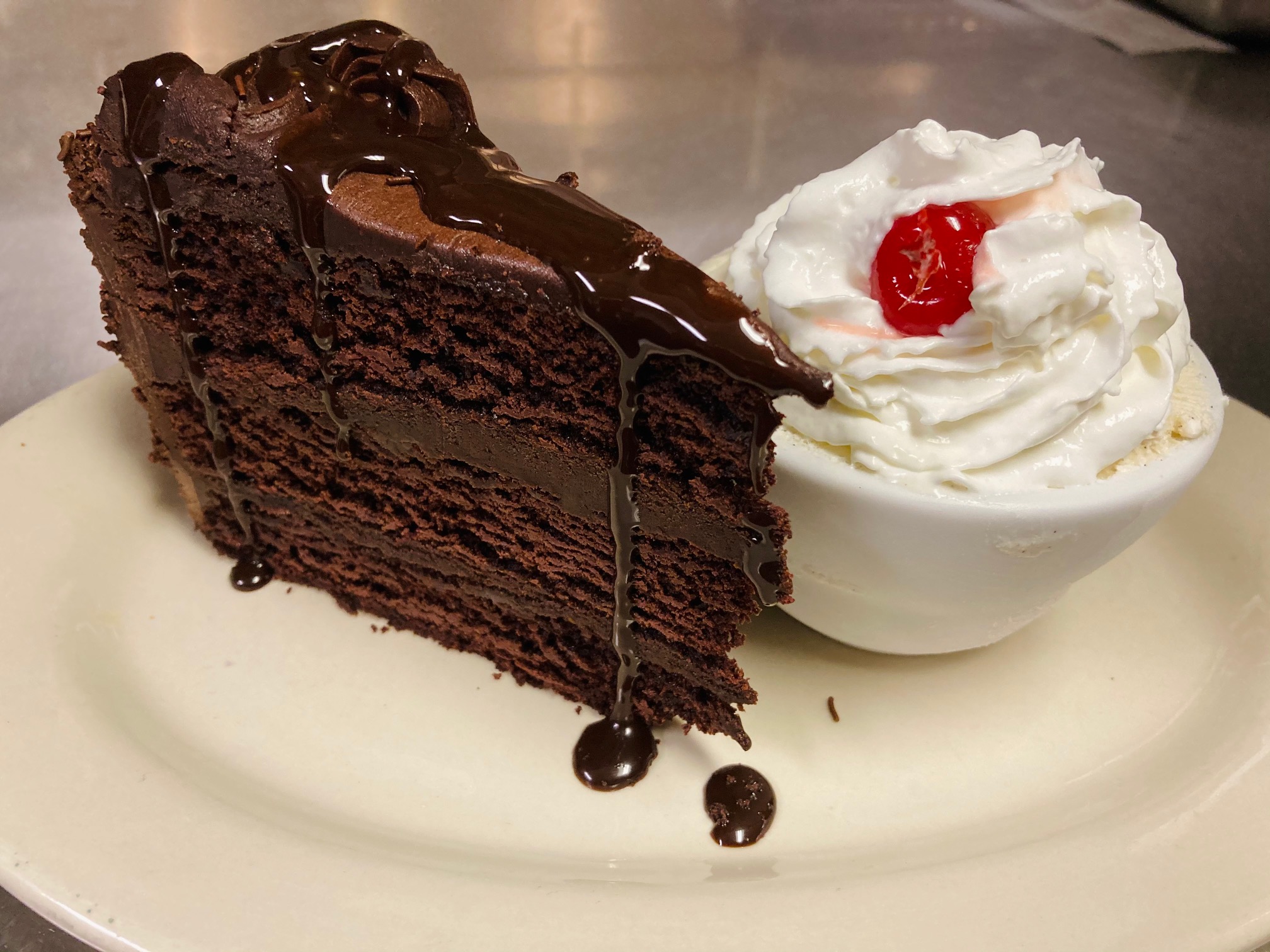 Order Jumbo Chocolate Cake food online from Saints Pub + Patio store, Independence on bringmethat.com