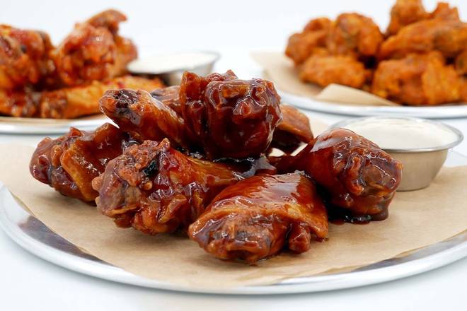 Order Family Pack (feeds 4-5) with Original or Boneless Wings  food online from Wing Zone store, Dayton on bringmethat.com