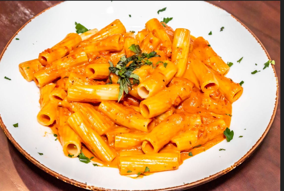 Order Pasta with Vodka Sauce - Pasta food online from Mamma Maria's Pizzeria and Ristorantes store, Bensenville on bringmethat.com