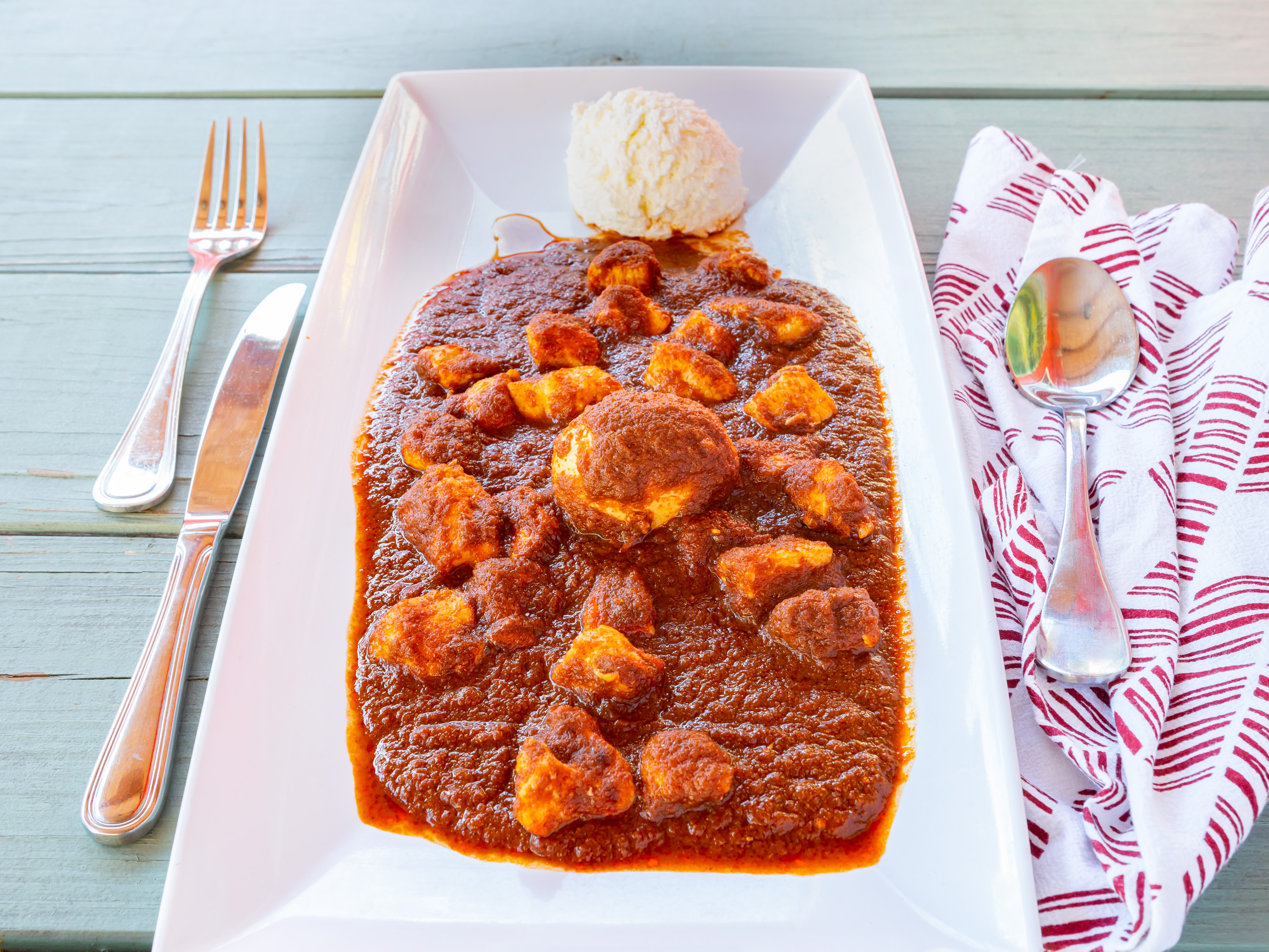 Order Doro Wat food online from Cafe Abyssinia store, New Orleans on bringmethat.com