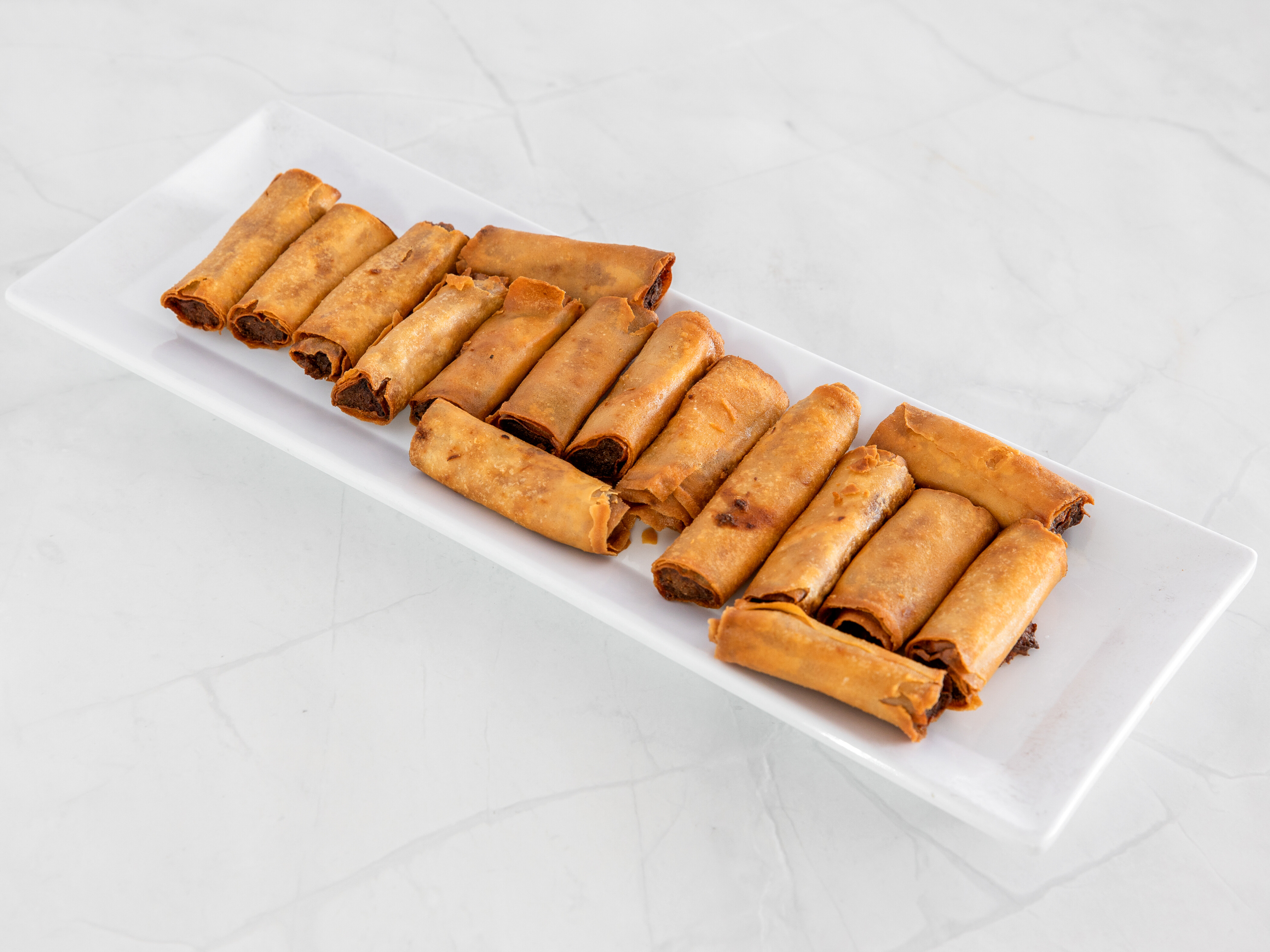 Order Lumpia Shanghai food online from The Dancing Crabs store, Chino on bringmethat.com