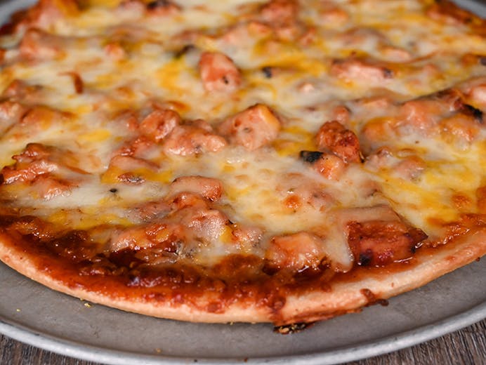 Order BBQ Chicken Pizza - Individual 7'' food online from Chicago Dough Company store, Richton Park on bringmethat.com