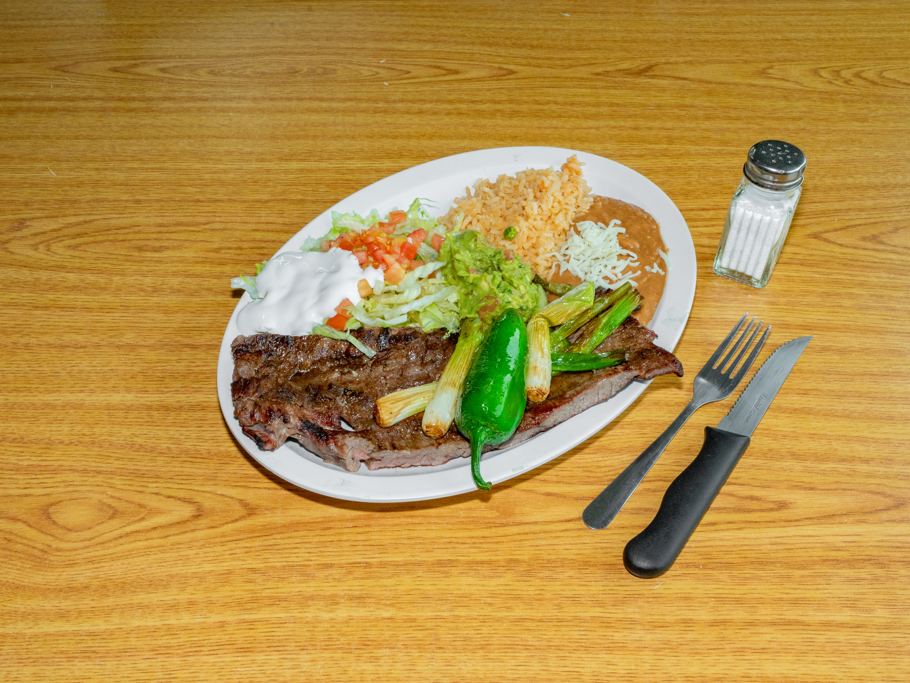 Order Carne Asada Steak Dinner food online from Whata Taco Authentic Mexican Food store, Country Club Hills on bringmethat.com