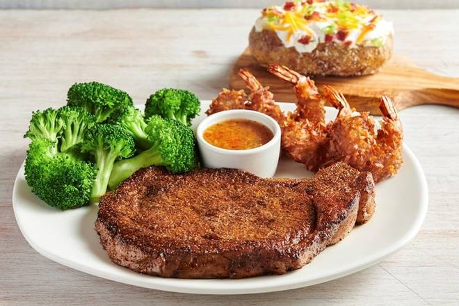 Order 12oz Ribeye* & Choice of Shrimp food online from Outback Steakhouse store, Foothill Ranch on bringmethat.com