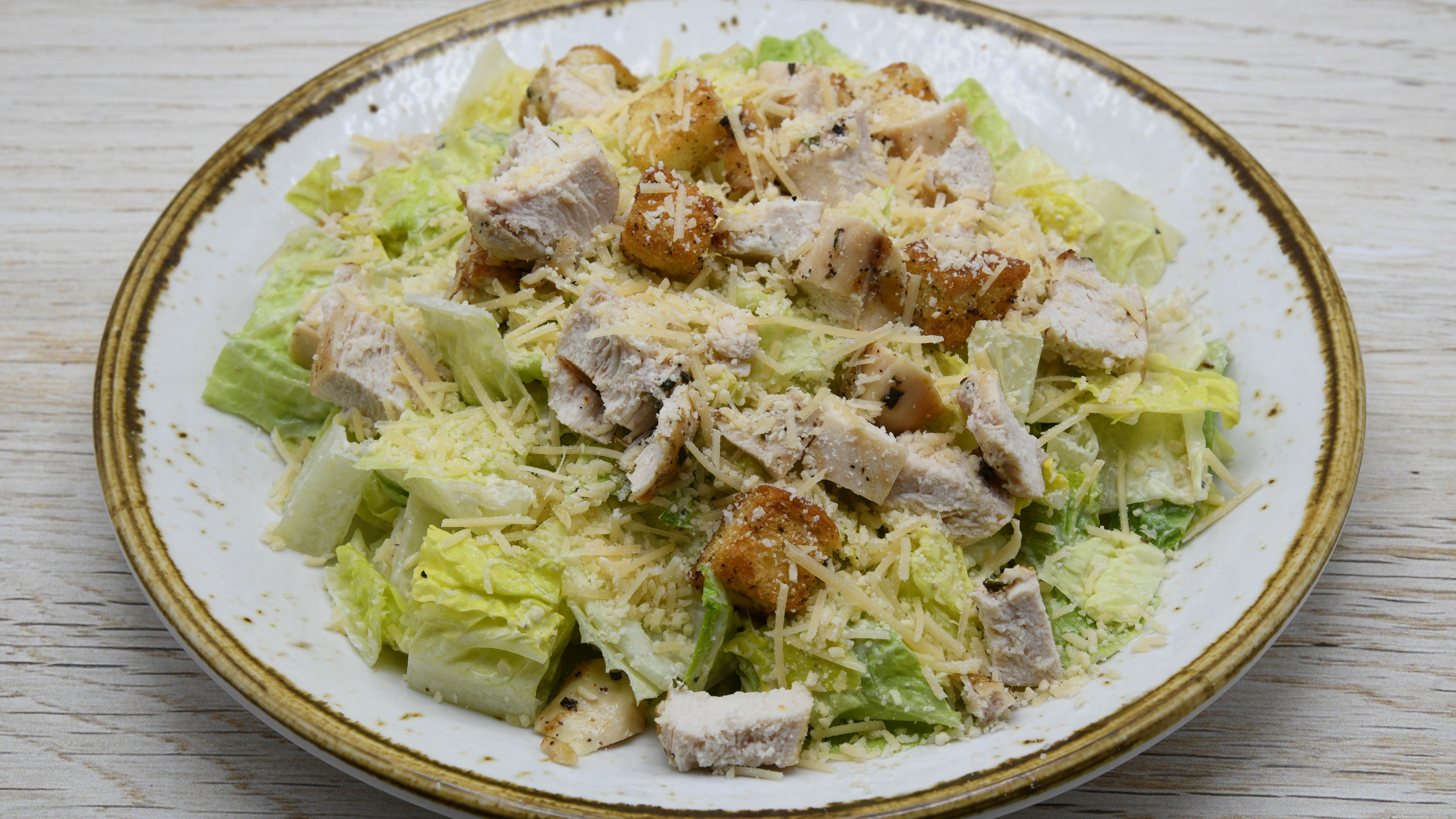 Order Chicken Caesar Salad food online from Bubba Gump Shrimp store, Gatlinburg on bringmethat.com