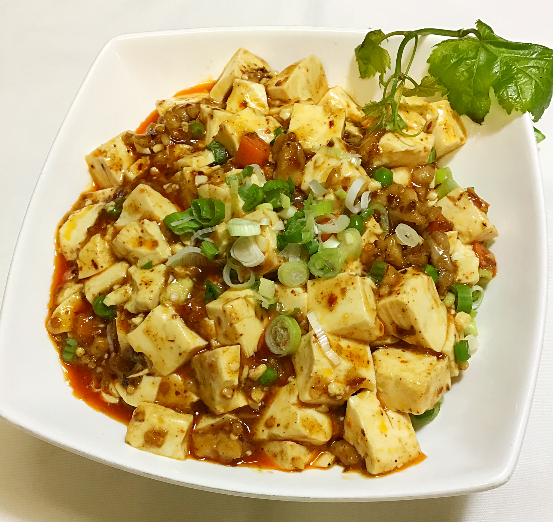 Order Mapo Tofu with Ground Pork food online from Orange Chicken Snob store, San Francisco on bringmethat.com