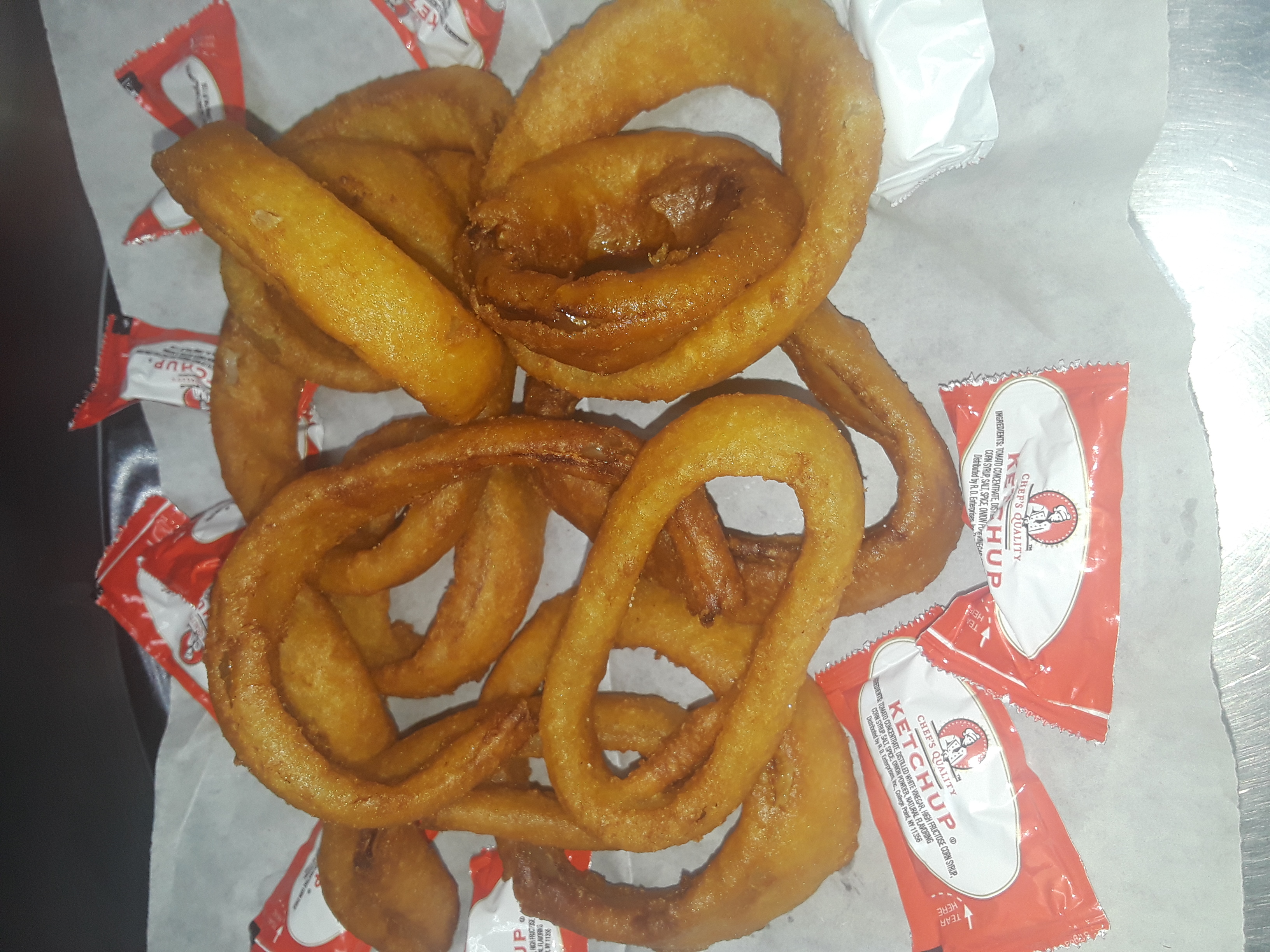 Order Onion Rings food online from Jenny's Pizza & Pasta store, Houston on bringmethat.com