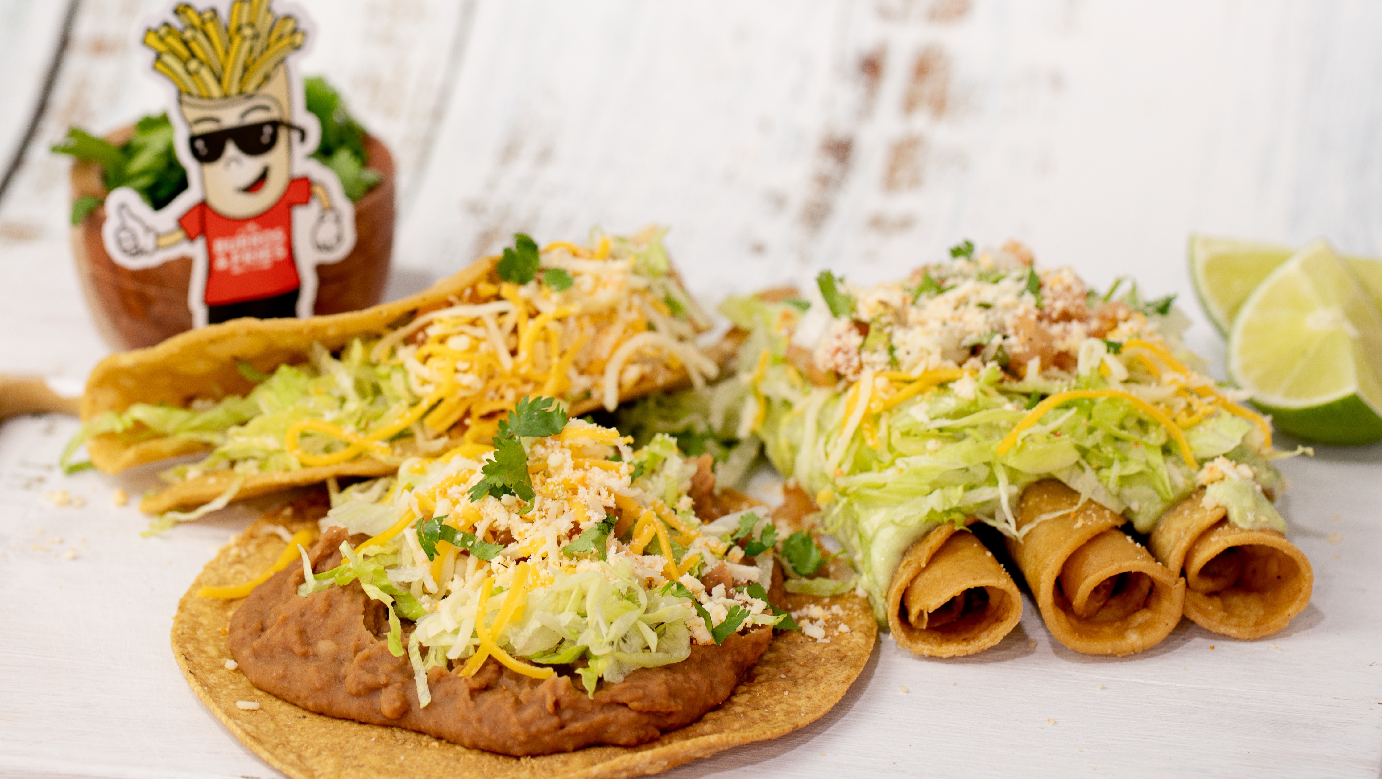 Order * 10 - Shredded Beef Taco, Bean Tostada + 3 Rolled Tacos food online from Burros & Fries store, Chula Vista on bringmethat.com