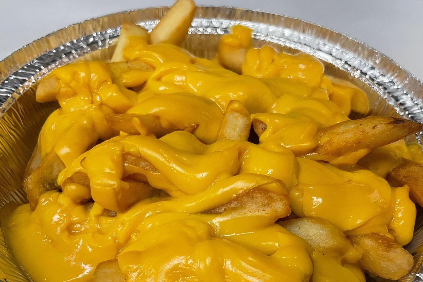 Order Cheese Fries food online from Brooklyn Burgers & Subs store, Los Angeles on bringmethat.com