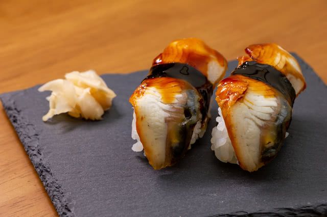 Order Unagi (Fresh water eel) Nigiri food online from Tgi Sushi store, San Jose on bringmethat.com