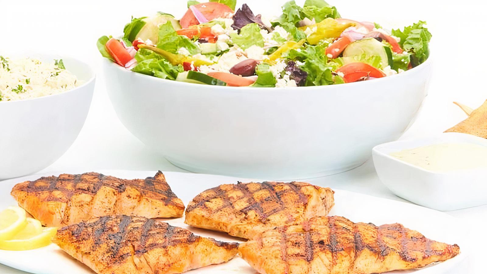 Order Grilled Salmon Family Feast for 6 food online from Taziki Mediterranean Cafe store, Atlanta on bringmethat.com