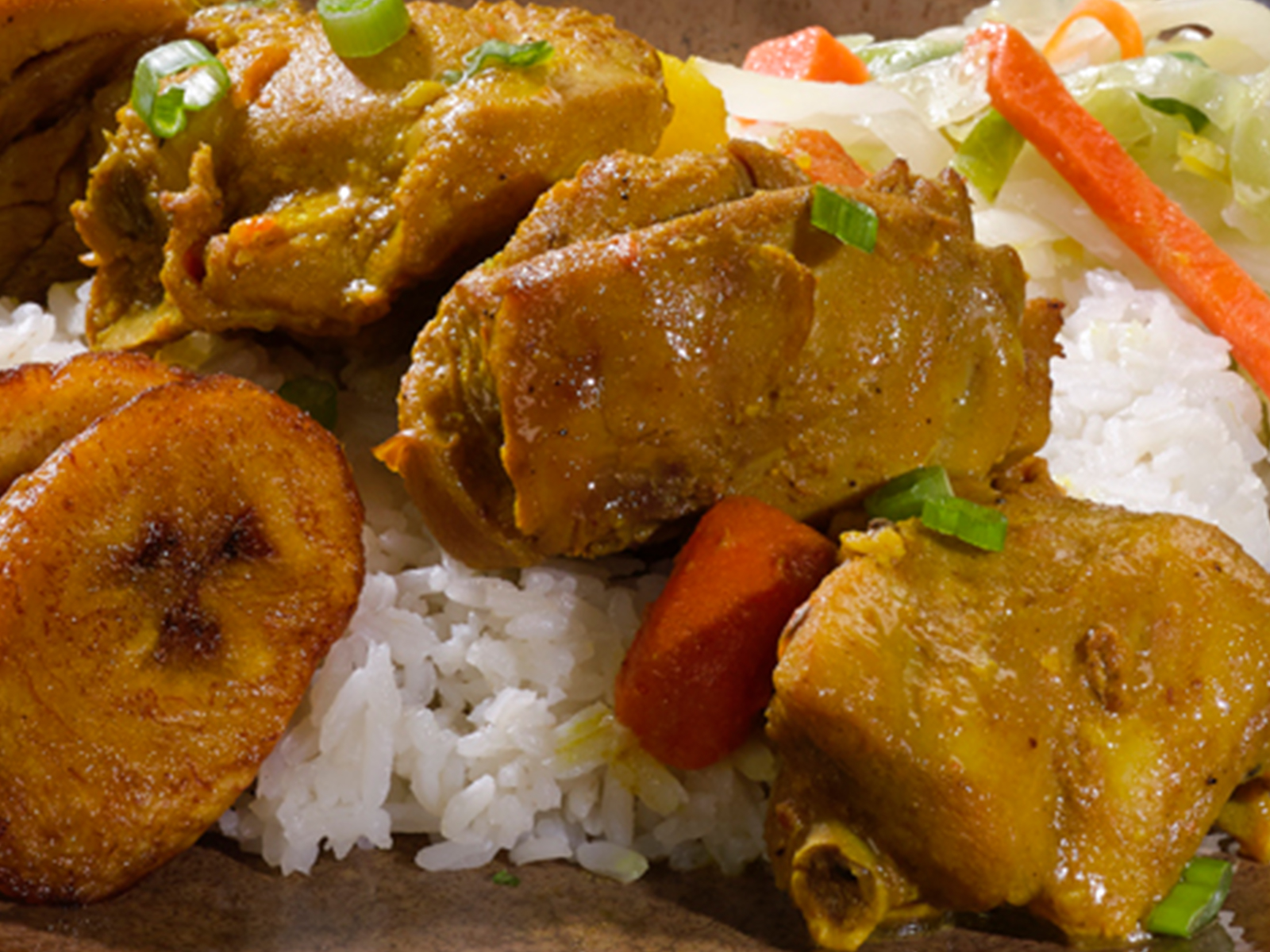 Order Curried Chicken Meal food online from Golden Krust Caribbean Restaurant store, New York on bringmethat.com