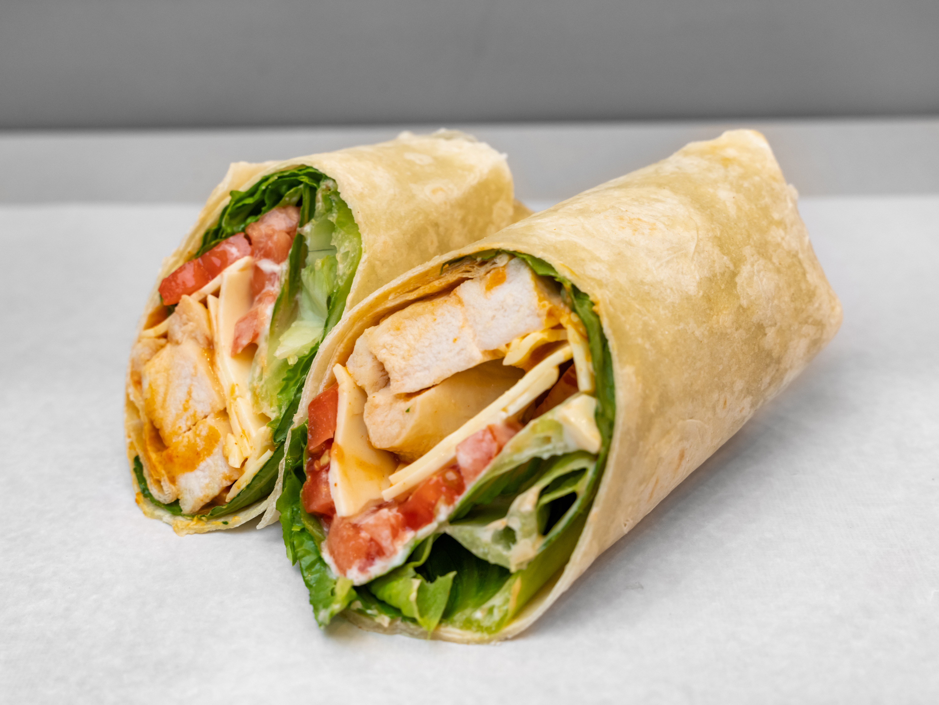 Order Chicken Caesar Wrap food online from Perfecto Caffe store, Peabody on bringmethat.com