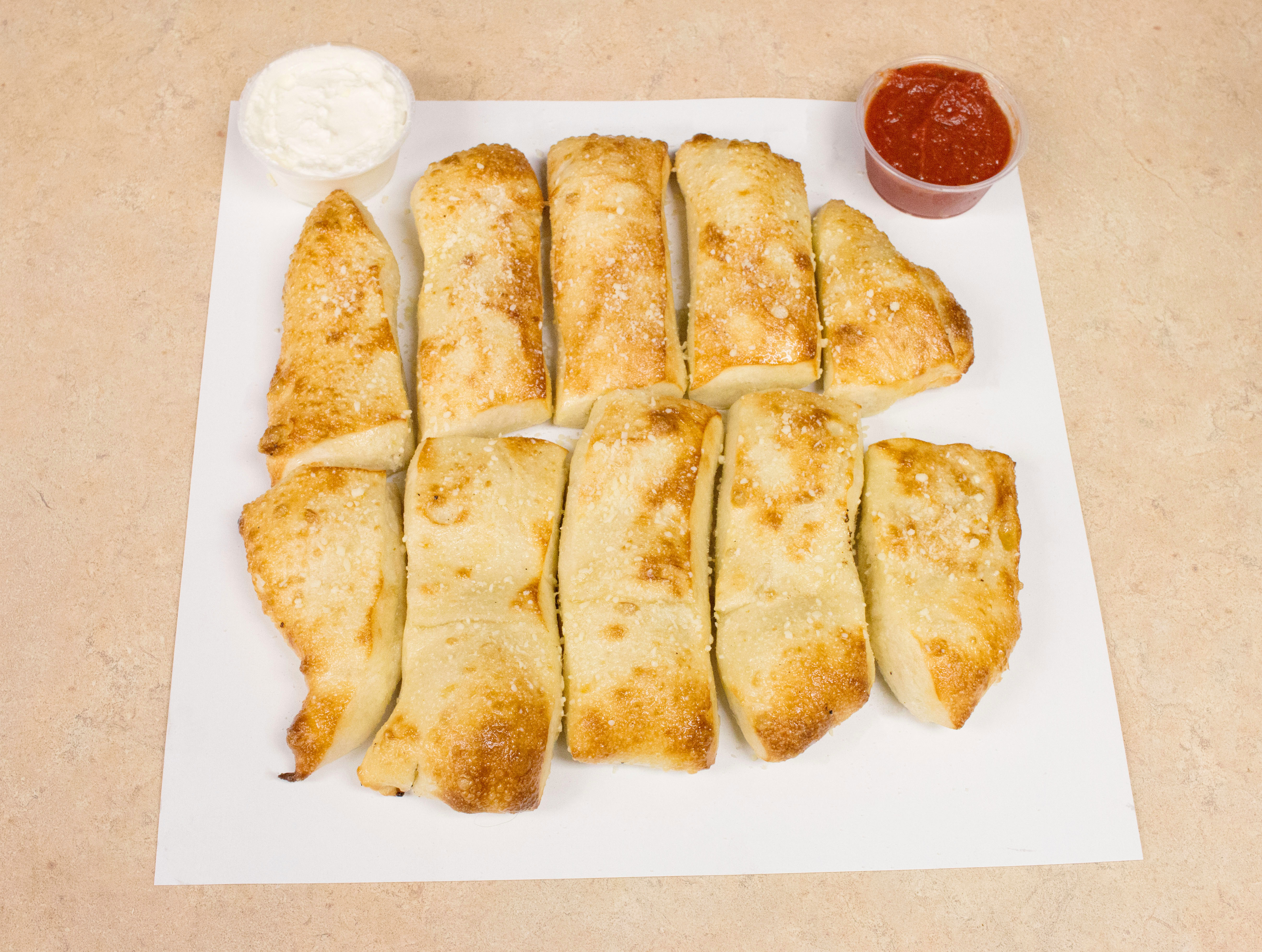 Order Garlic Stix Bread food online from Grapes And Hops Market store, Waterford on bringmethat.com