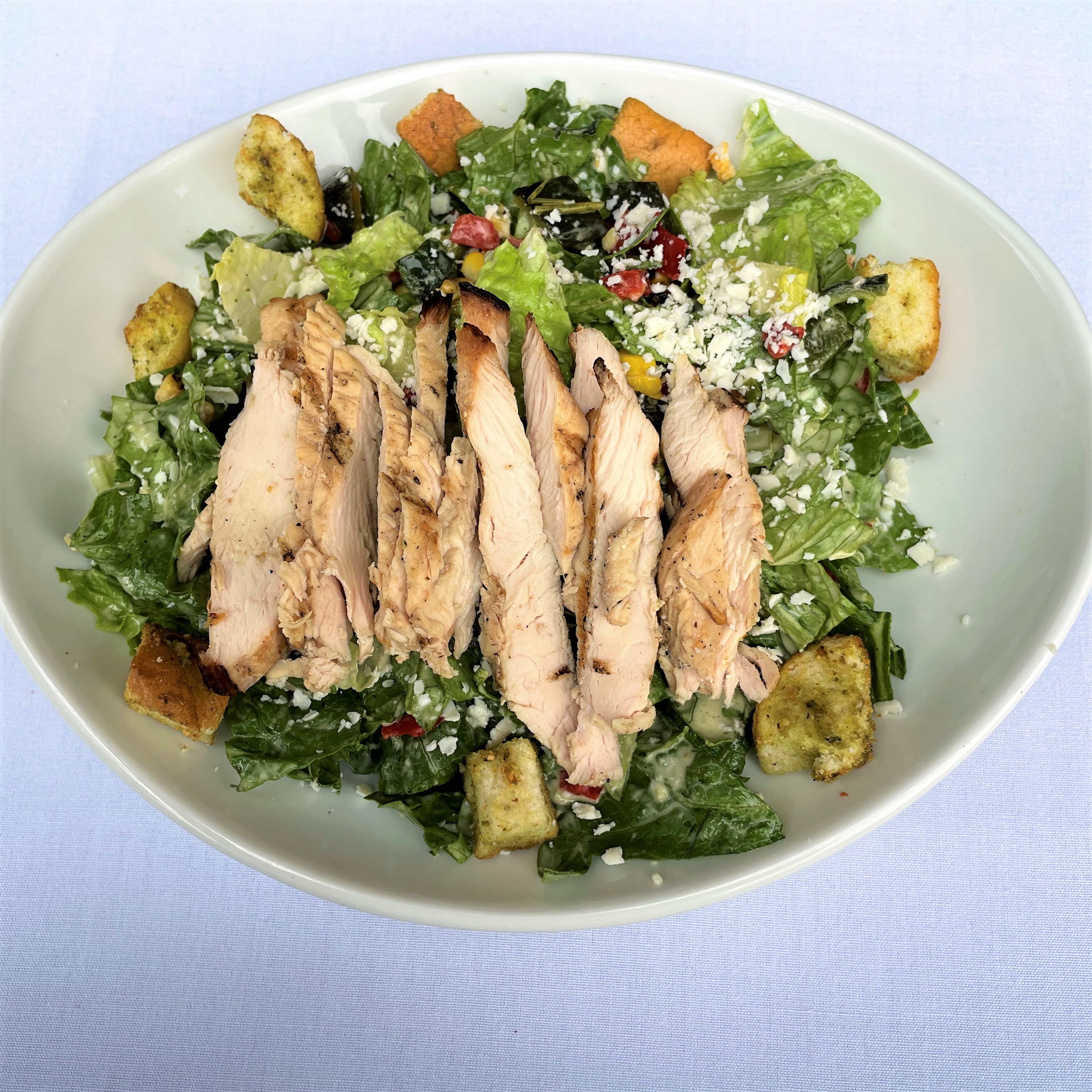 Order Southwest Chicken Caeser Salad food online from Blue Mesa Grill store, Addison on bringmethat.com