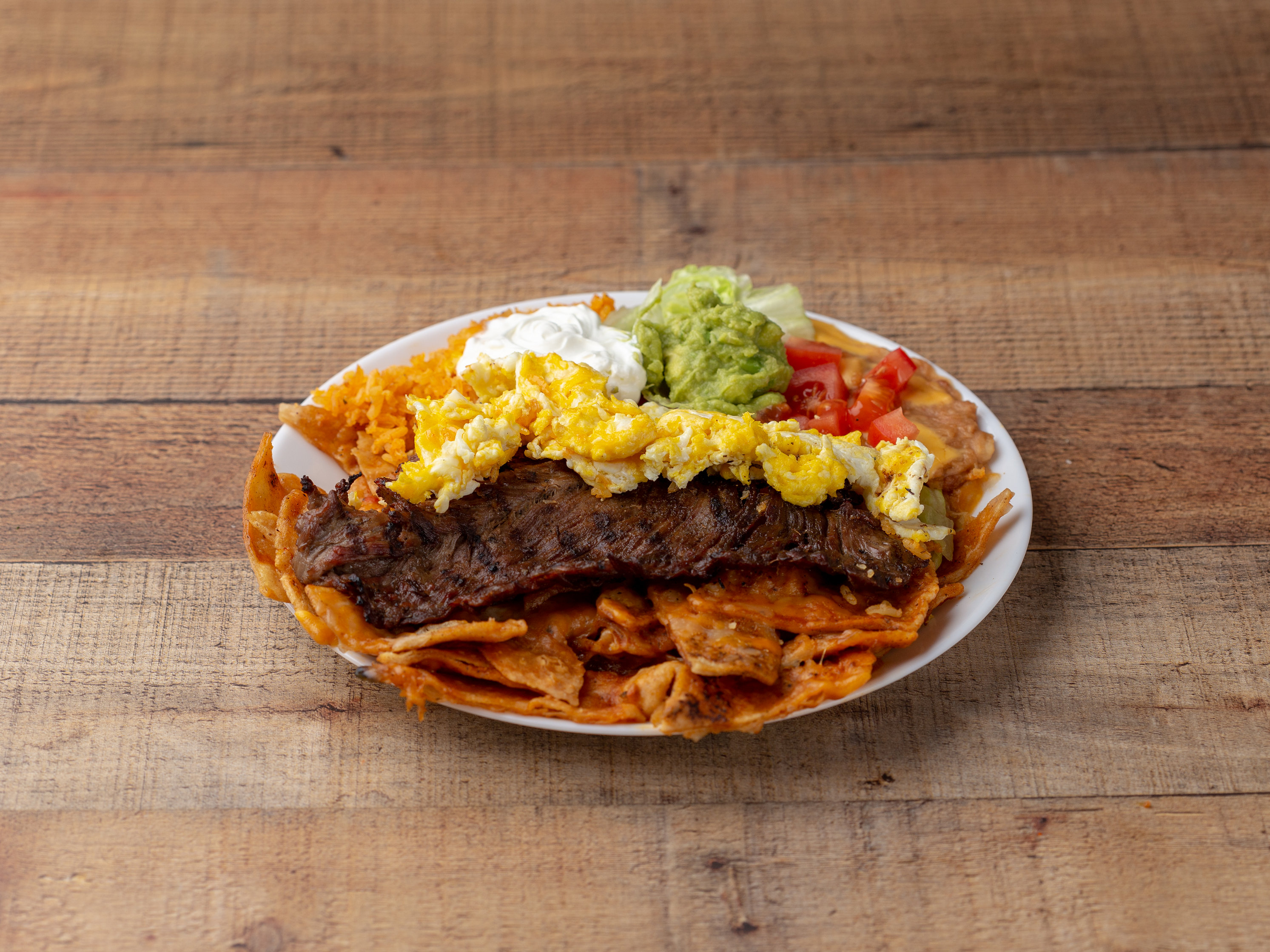 Order Carne Asada, Chilaquiles and Eggs food online from The Bonanza Restaurant store, Long Beach on bringmethat.com