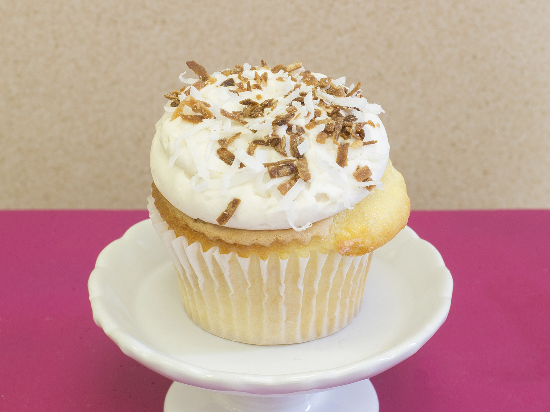 Order Pineapple Coconut Cupcake food online from Livay Sweet Shop store, Plainfield on bringmethat.com