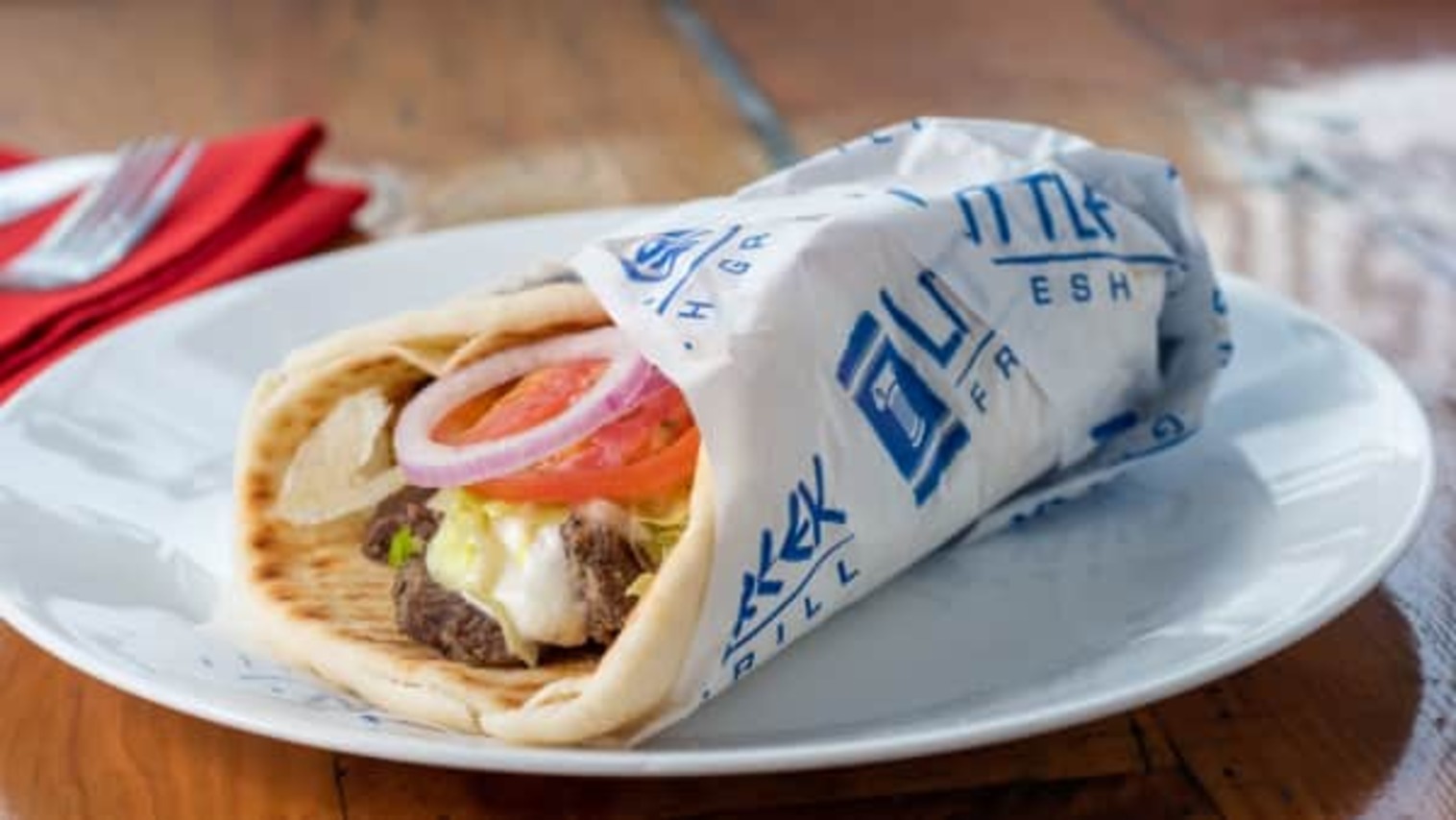 Order STEAK PITA food online from Little Greek Fresh Grill store, Youngstown on bringmethat.com