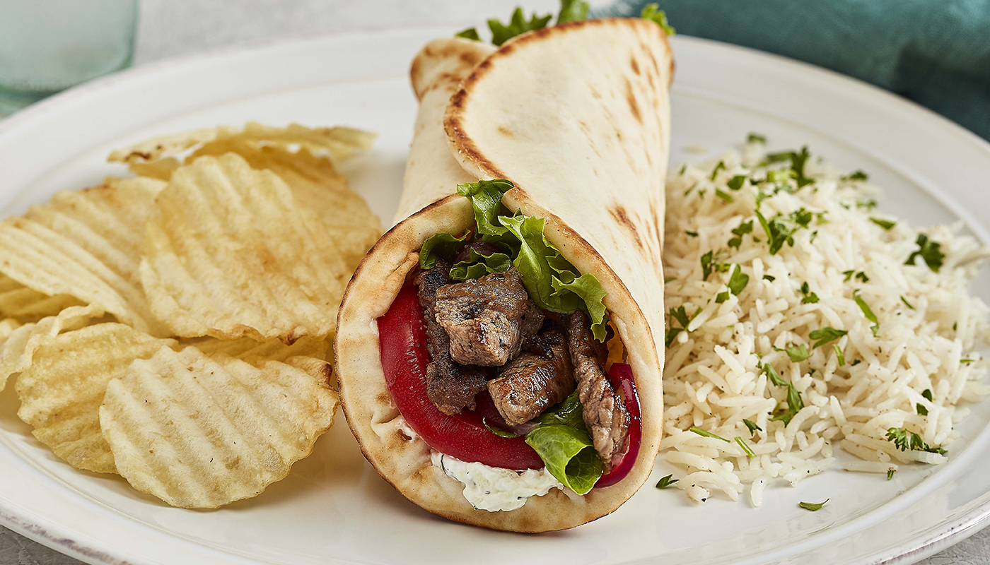 Order Grilled Lamb Gyro food online from Taziki Mediterranean Café store, Knoxville on bringmethat.com