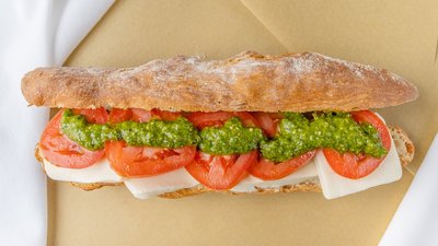 Order #10 Mozzarella with Tomato & Pesto on a Demi-Baguette* food online from Longfellow store, Mahwah on bringmethat.com