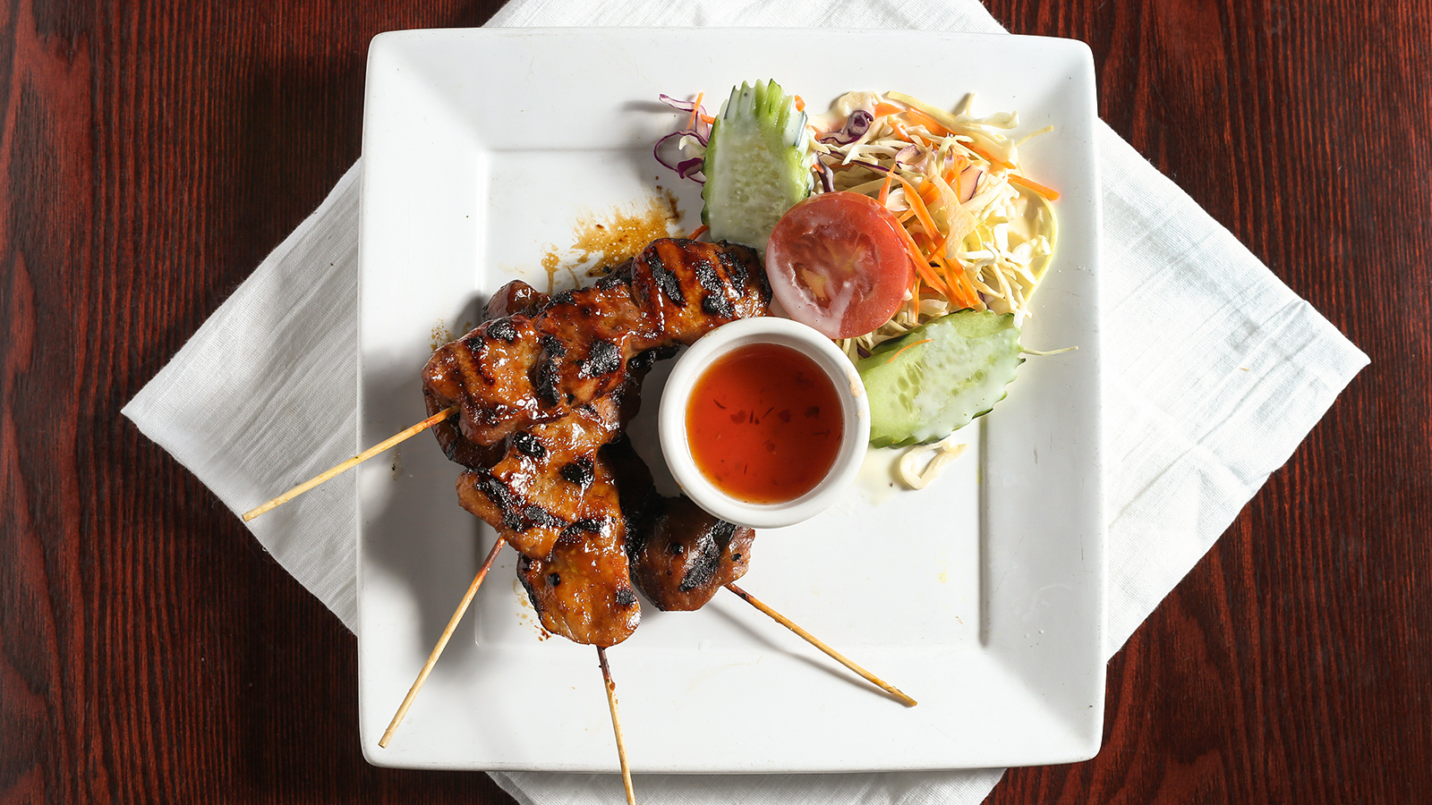 Order 2. Chiang Mai BBQ Pork food online from Siam Lotus store, Beaverton on bringmethat.com